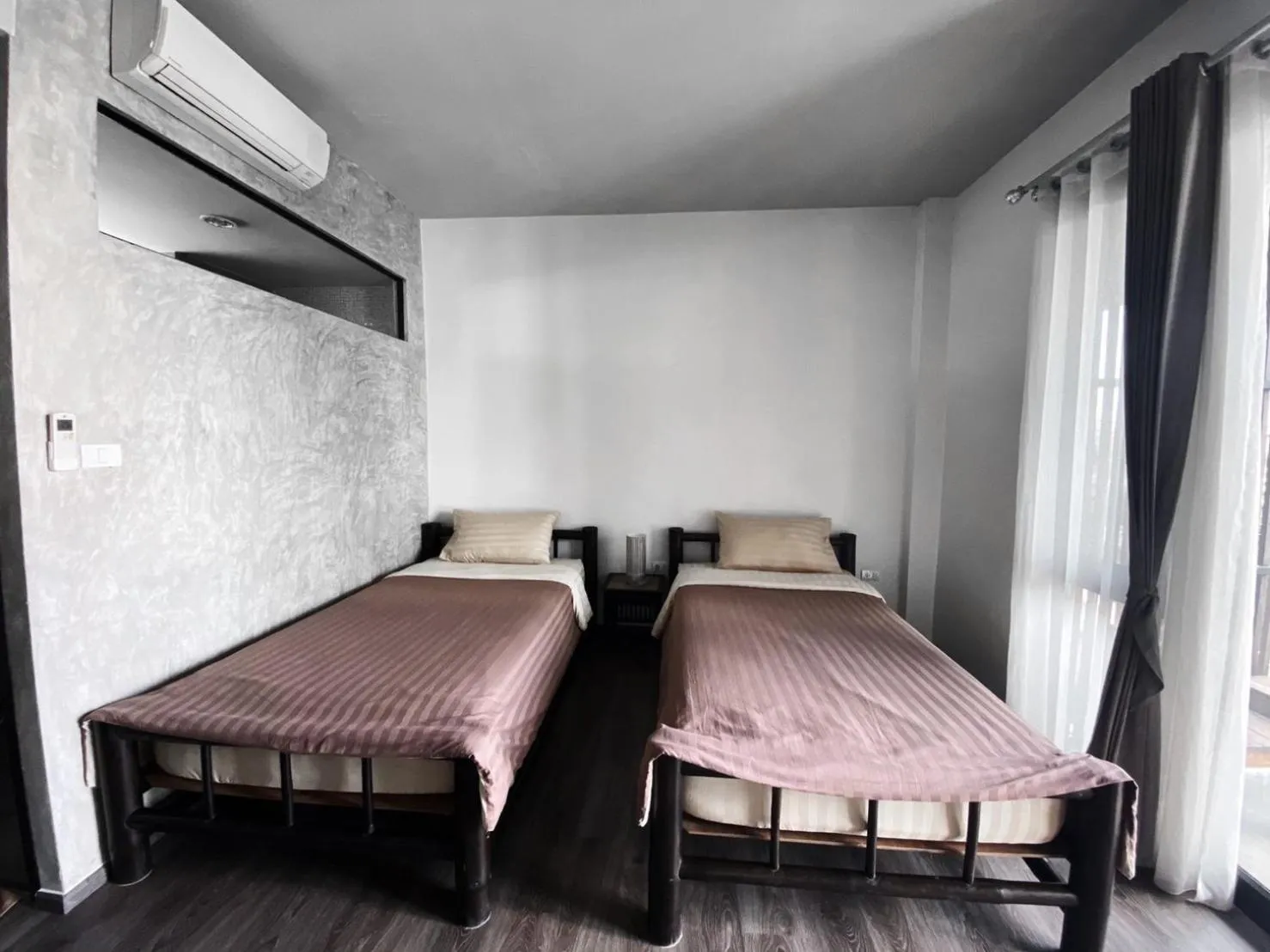 Bed in Lamphu House Chiang Mai