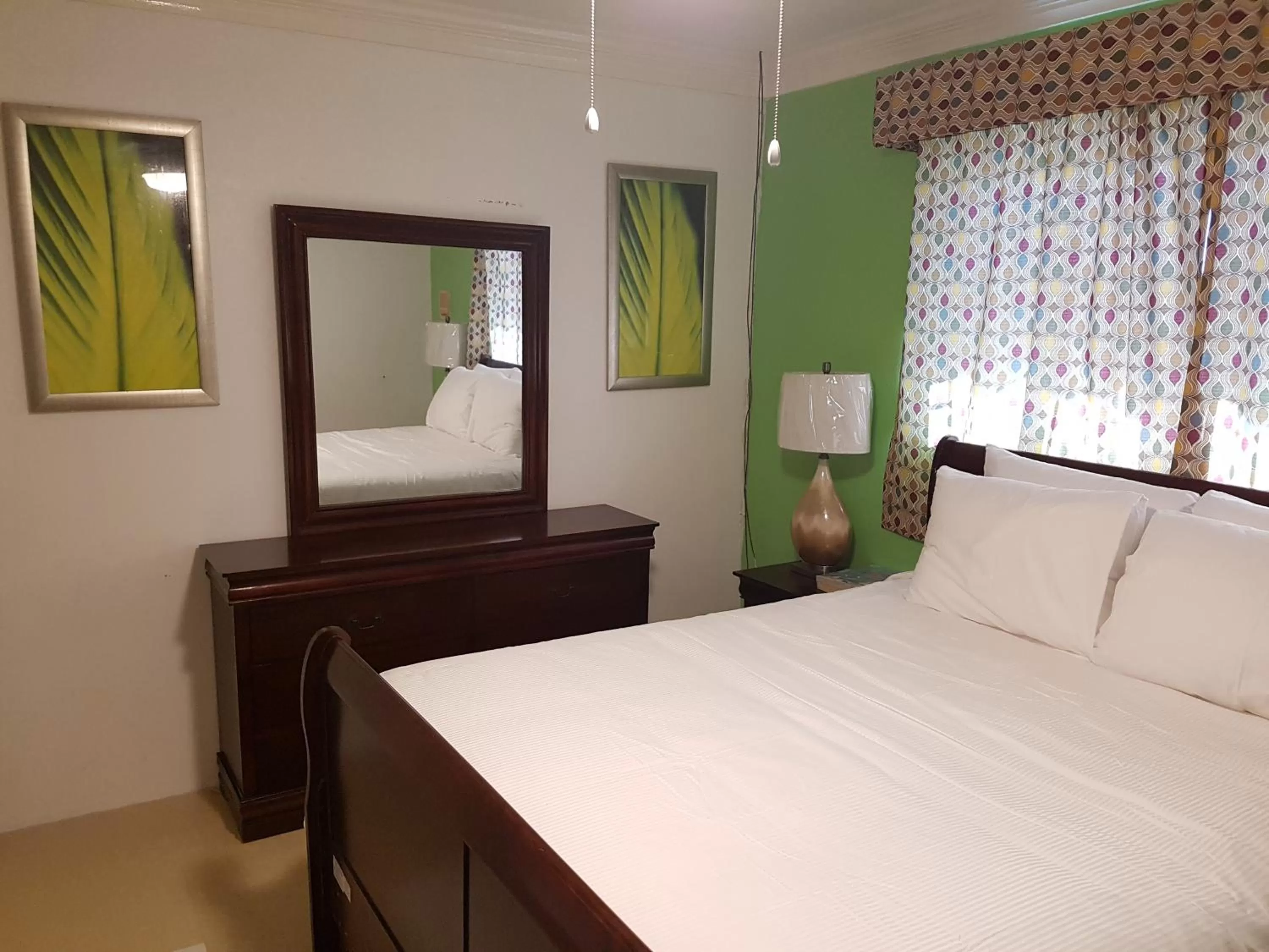 Bed in Golden Palm B & B