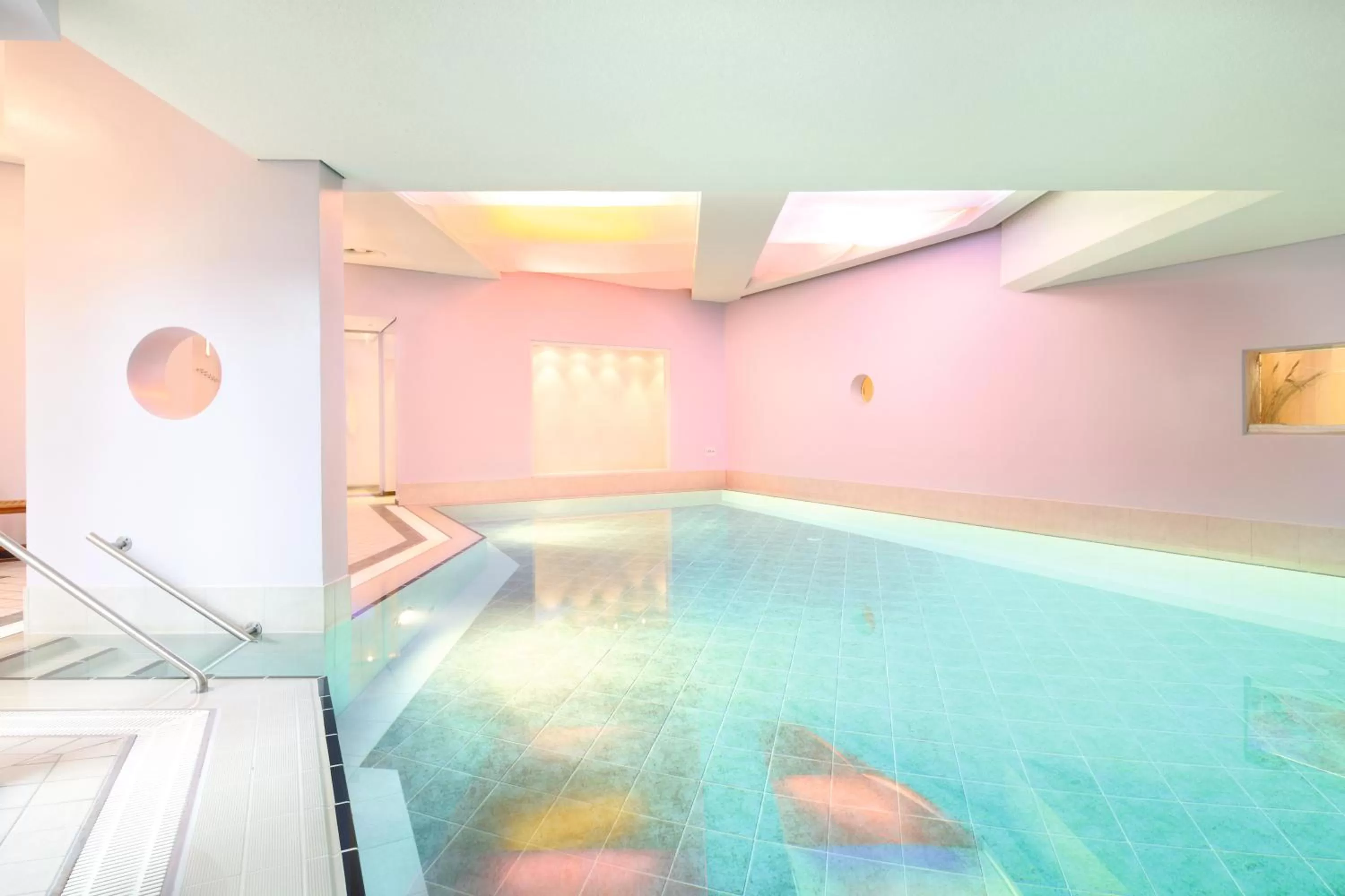 Swimming pool in ambassador hotel & spa