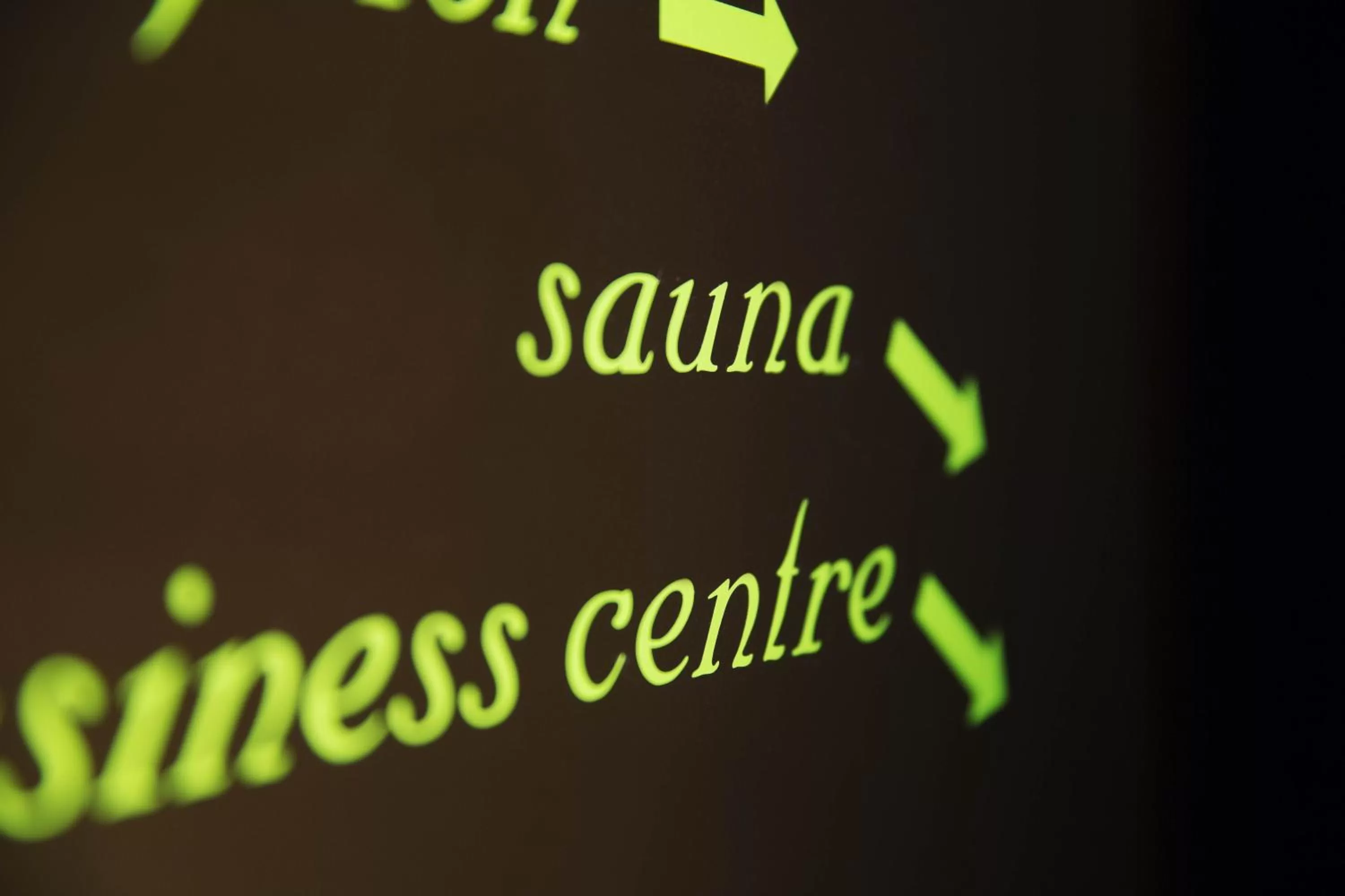 Communal lounge/ TV room in Hôtel Le Fabe