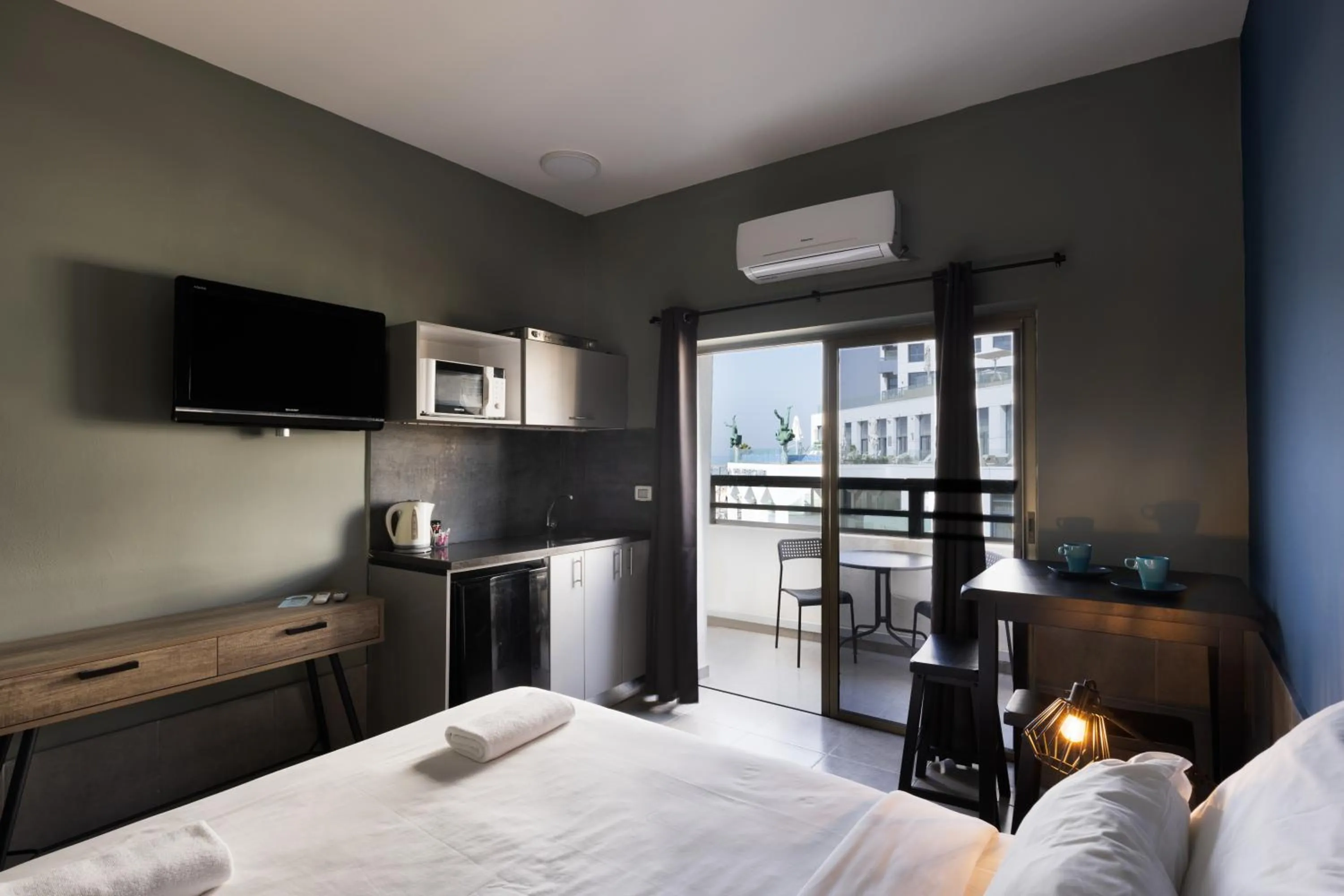 Photo of the whole room, Bed in Liber Tel Aviv Sea Shore Suites BY RAPHAEL HOTELS