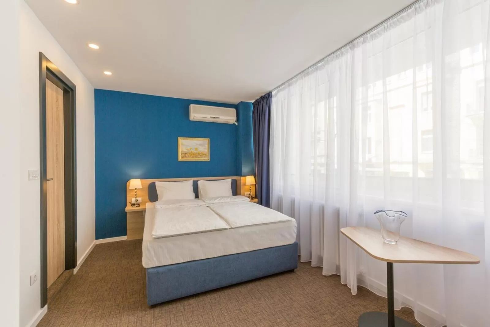 Bedroom, Bed in Premium Crown Suites