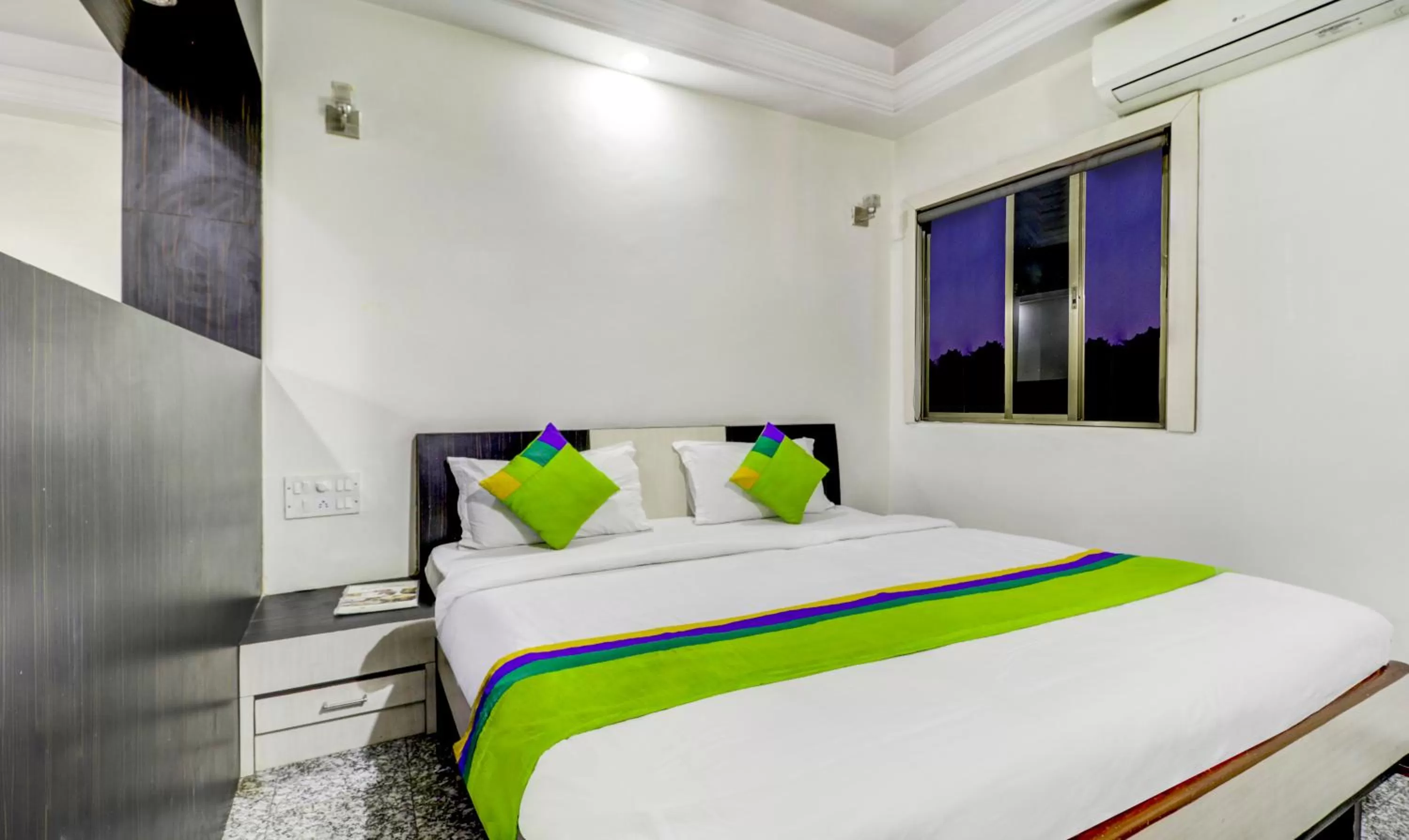 Bed in Treebo Trend Orange City