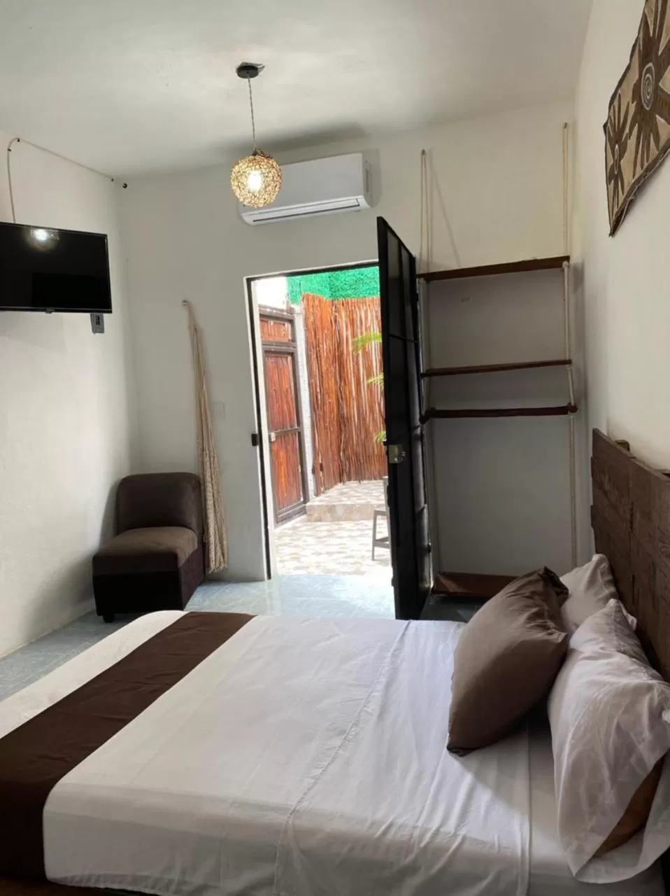 Photo of the whole room, Bed in Hotel Casa de luz Playa del Carmen