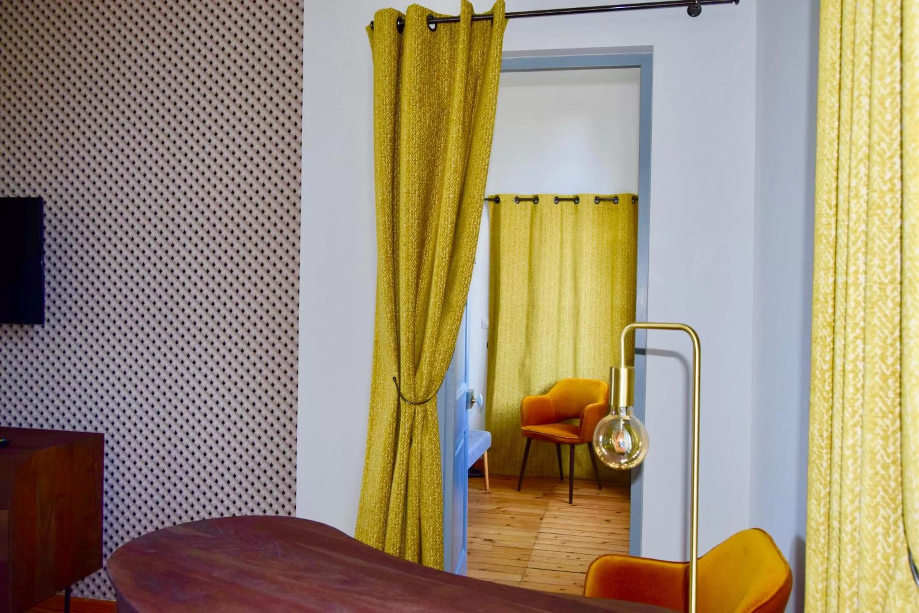 Seating area in Chambres d'Hôtes Le Clos des Marronniers