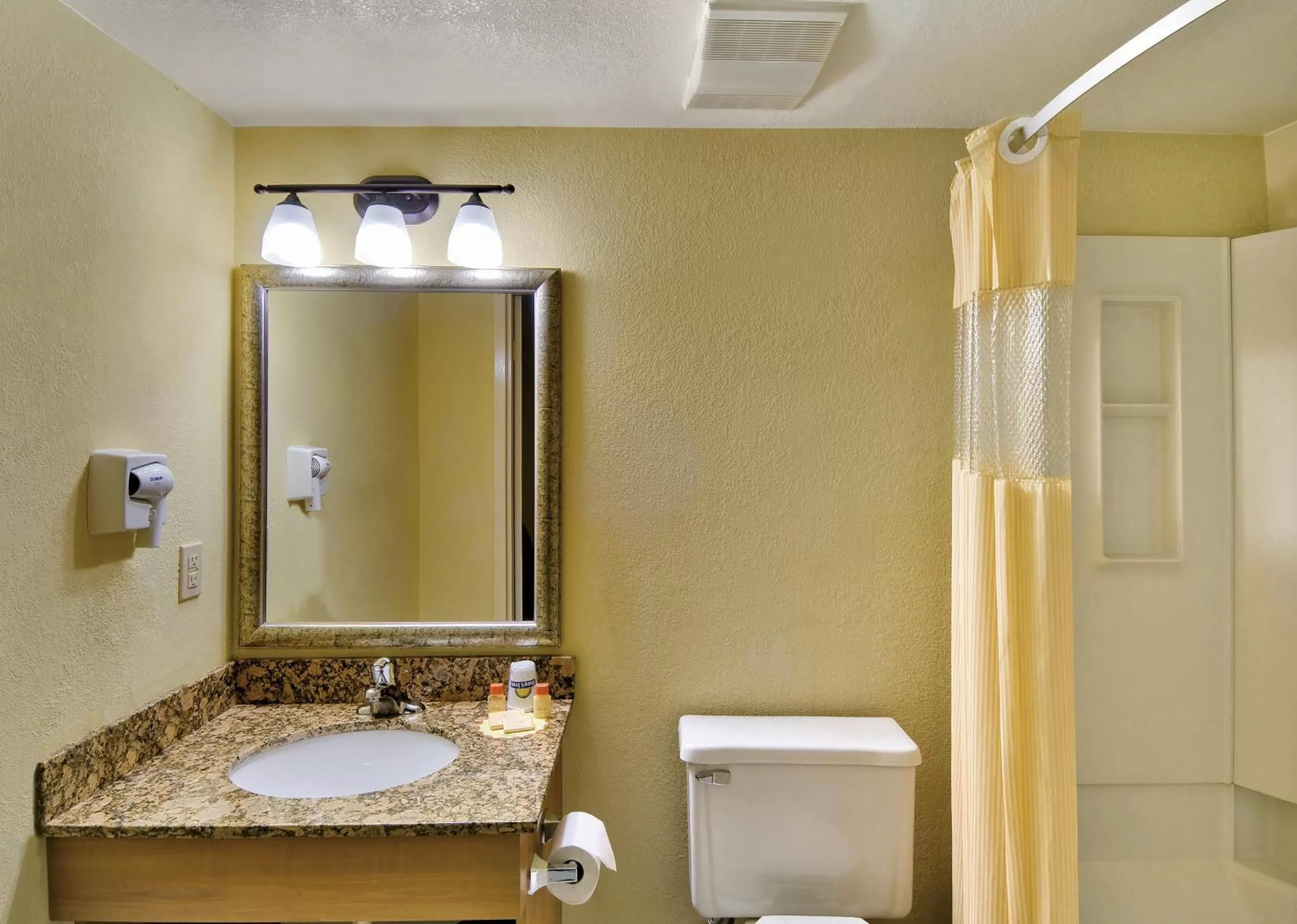 Bathroom in Days Inn by Wyndham East Windsor/Hightstown