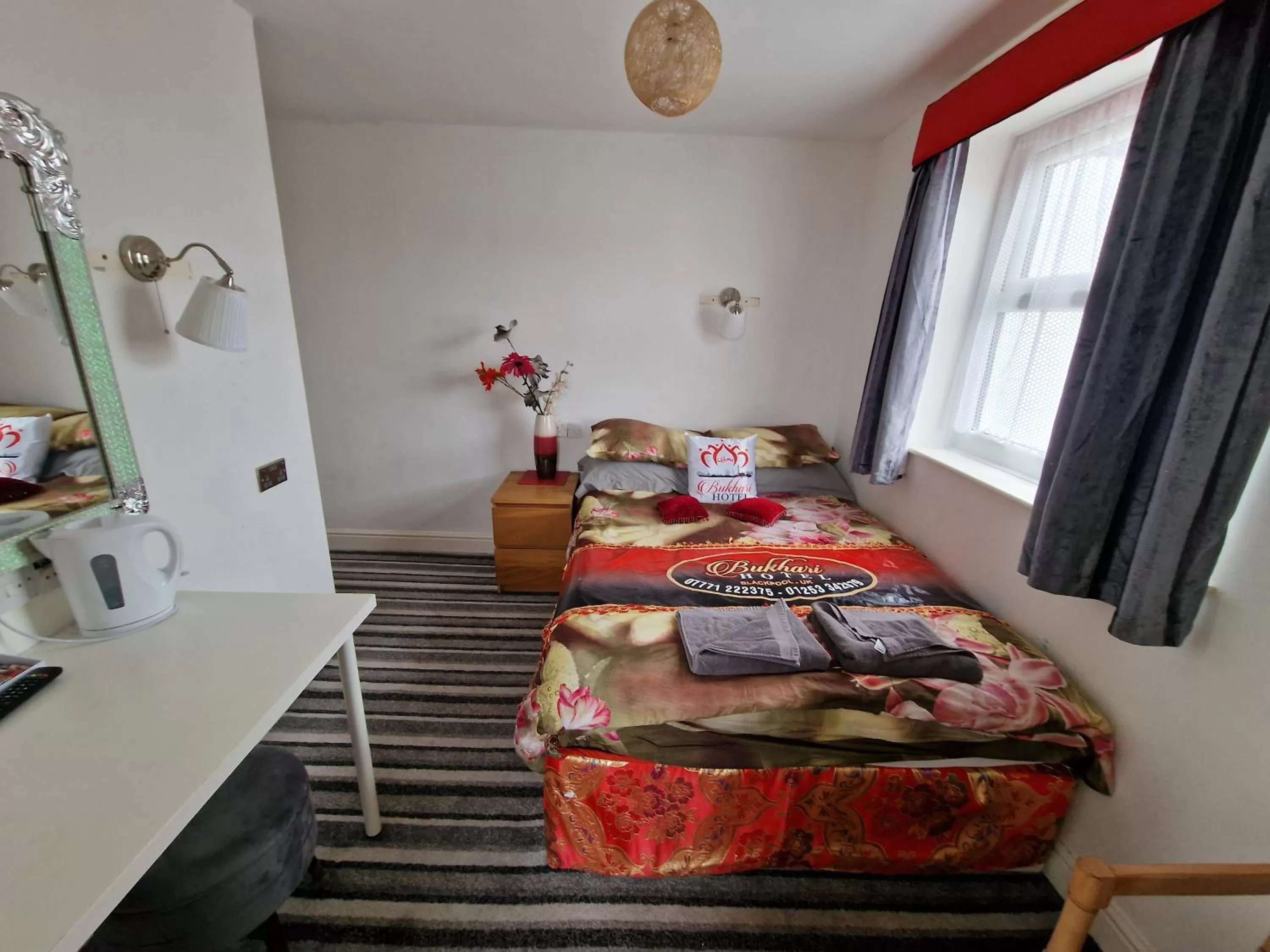 Bed in BUKHARI Hotel