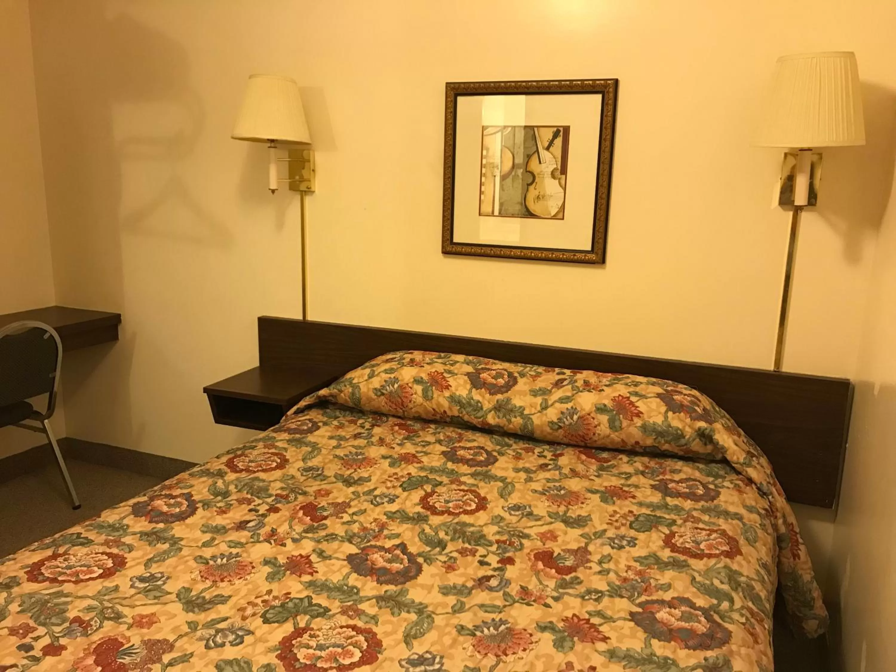 Bedroom in Motel Grand