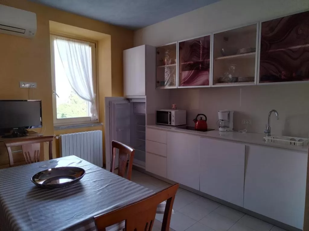 Kitchen/Kitchenette in Borgo al Sole by Garda Facilities
