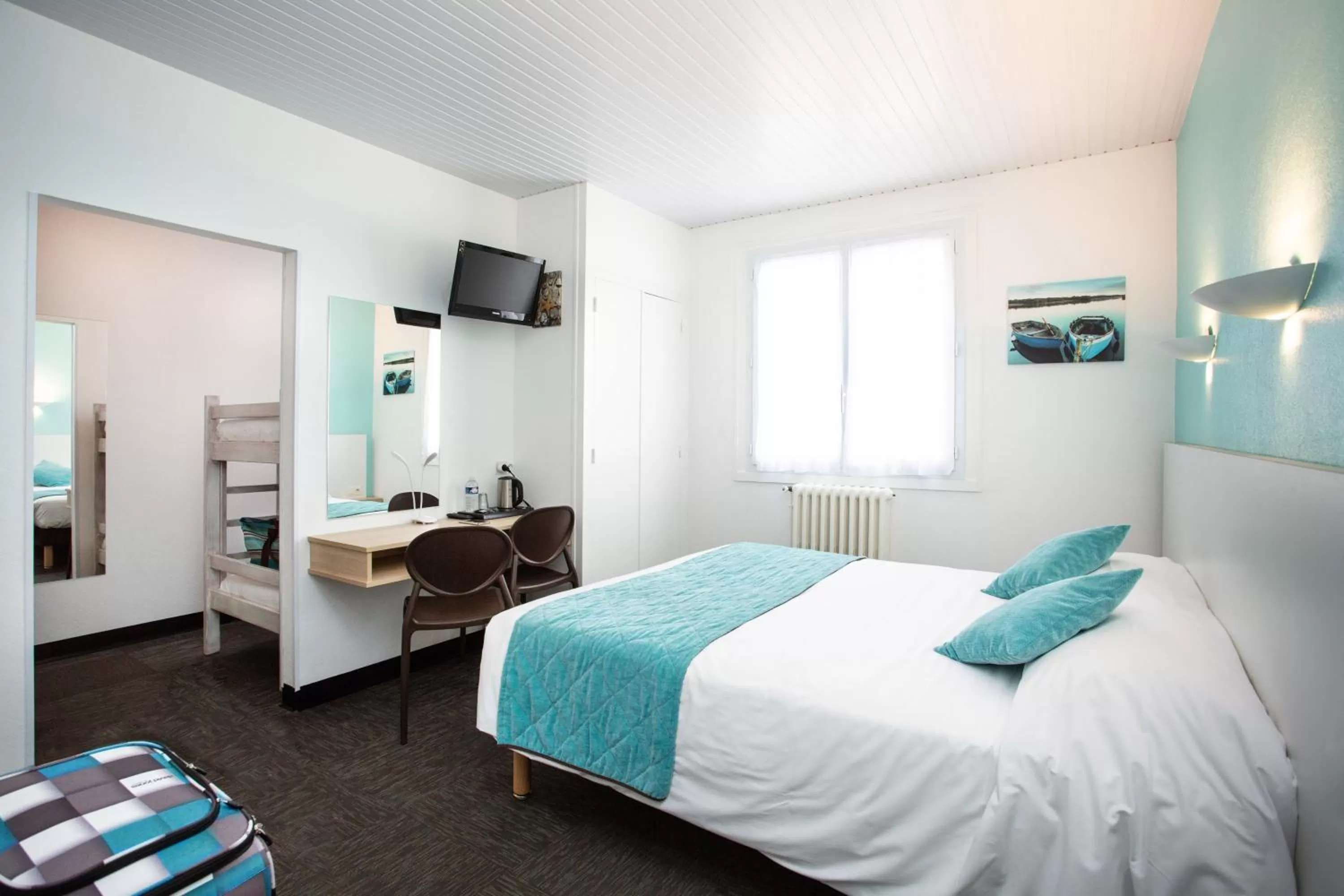 Bed in Hotel Les Dunes