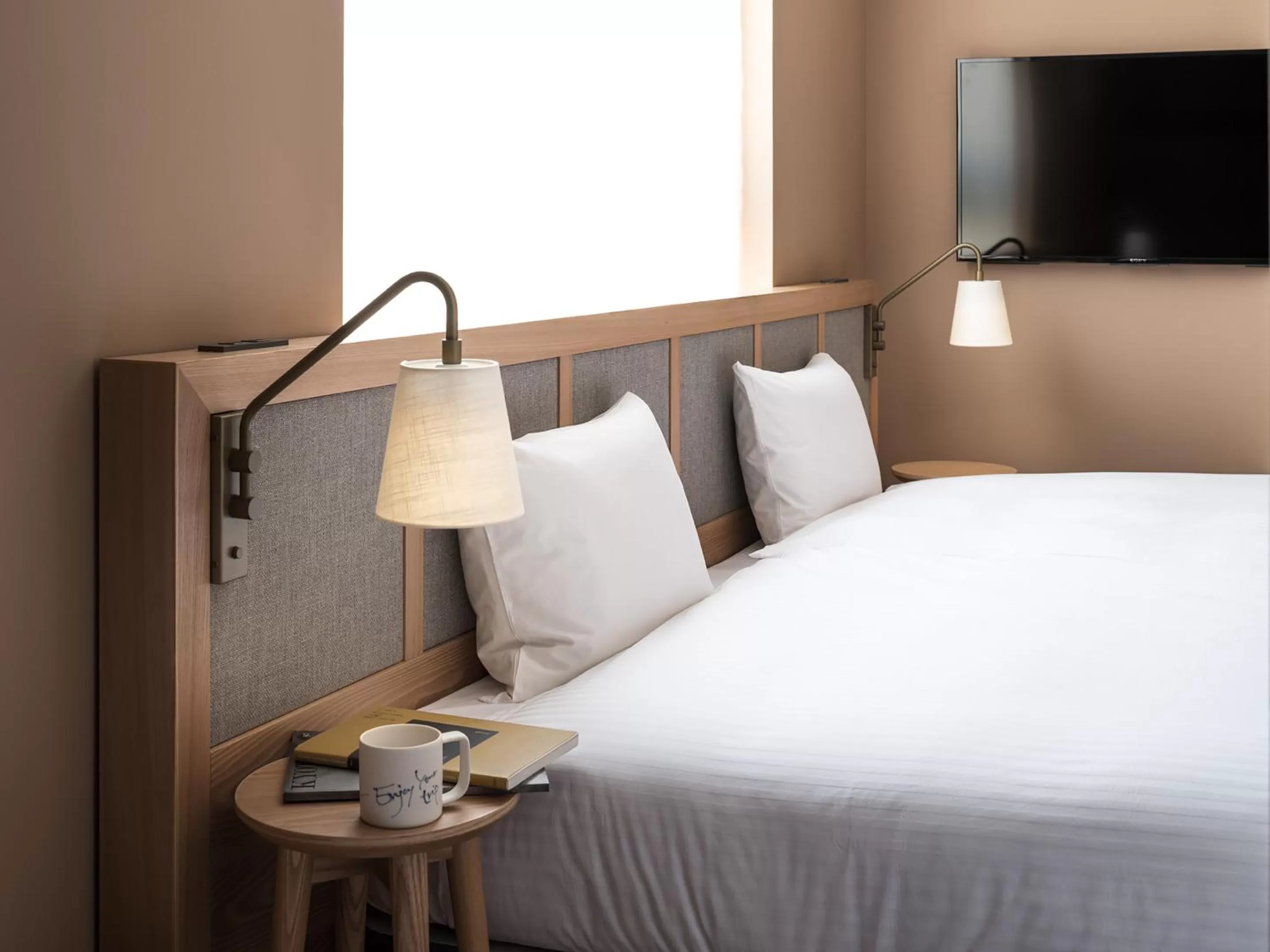 Photo of the whole room, Bed in RAKURO Kyoto by THE SHARE HOTELS