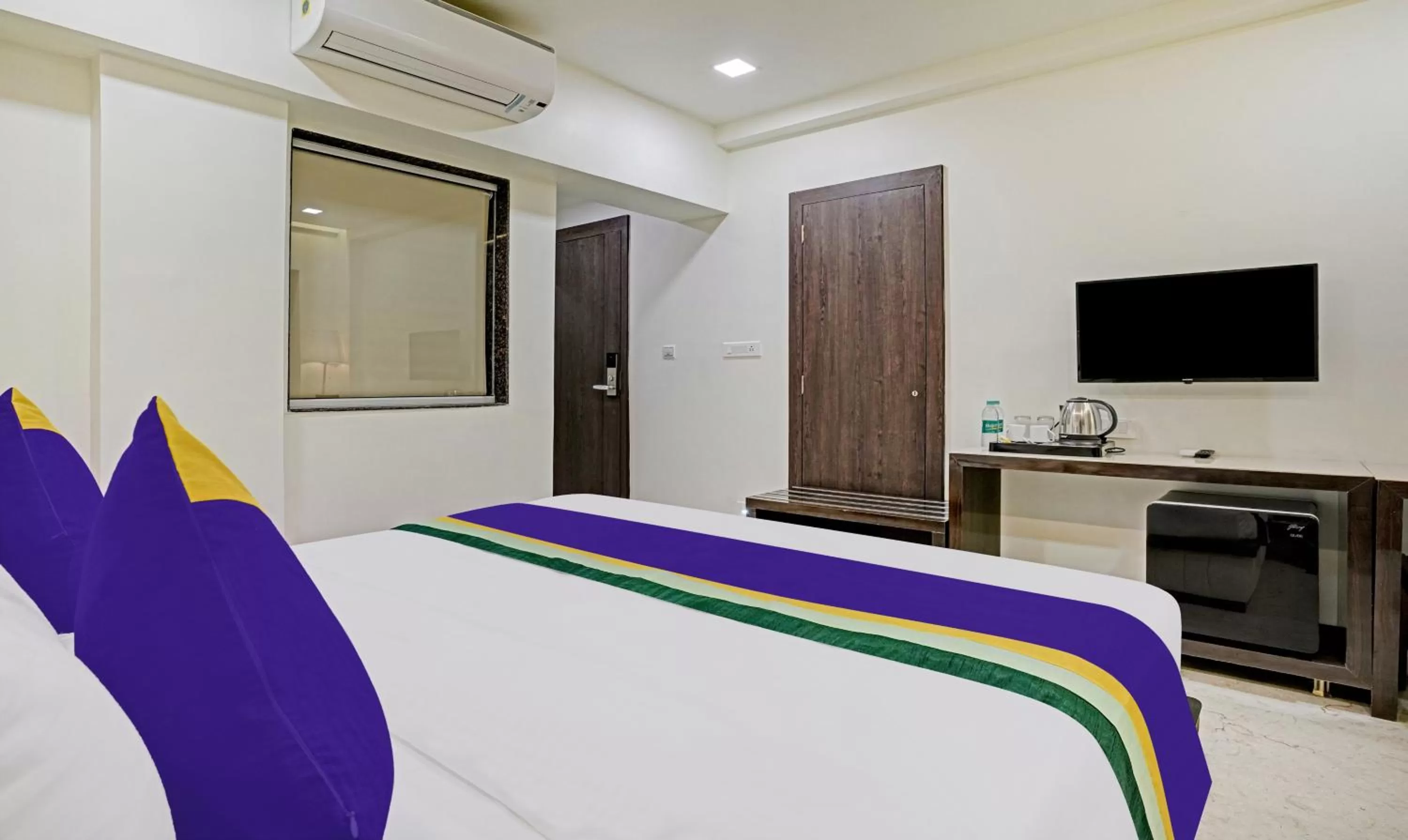 Bedroom, Bed in Treebo Premium Golden Bliss Trimurti Nagar Square