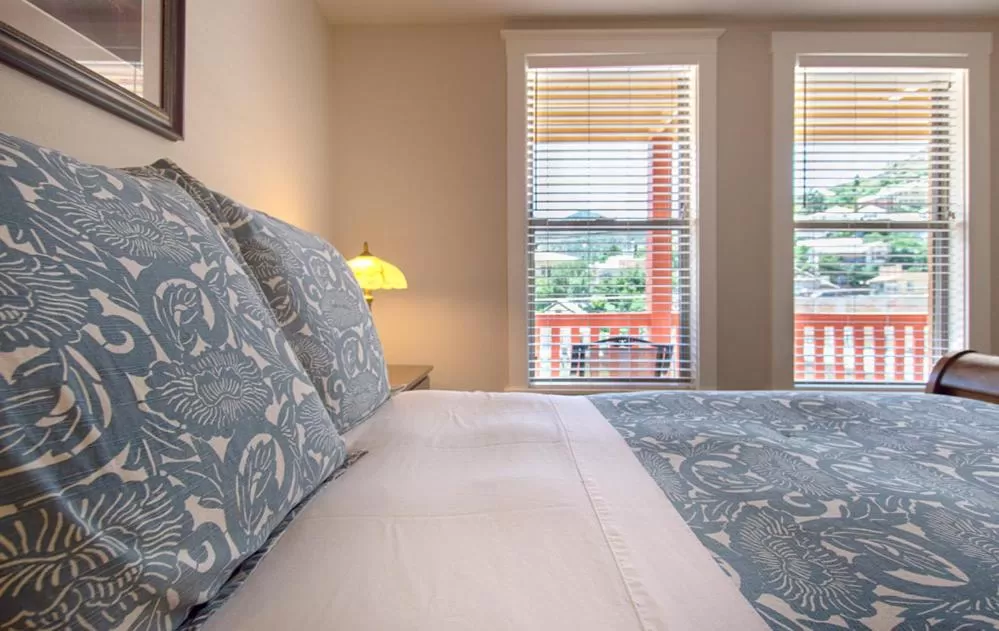 Bed in Eldorado Suites Hotel