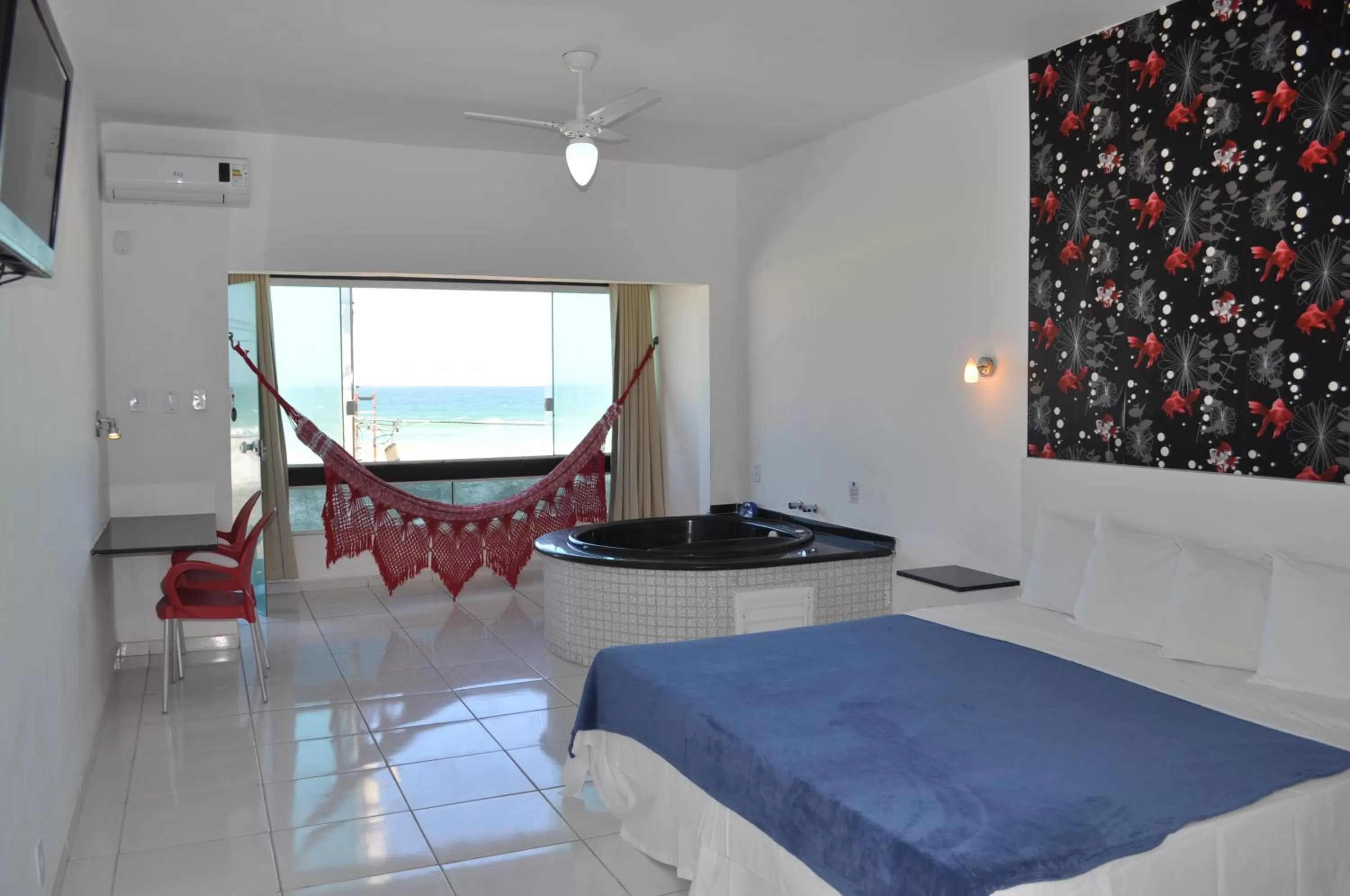 Balcony/Terrace, Bed in Pousada Laguna Hotel