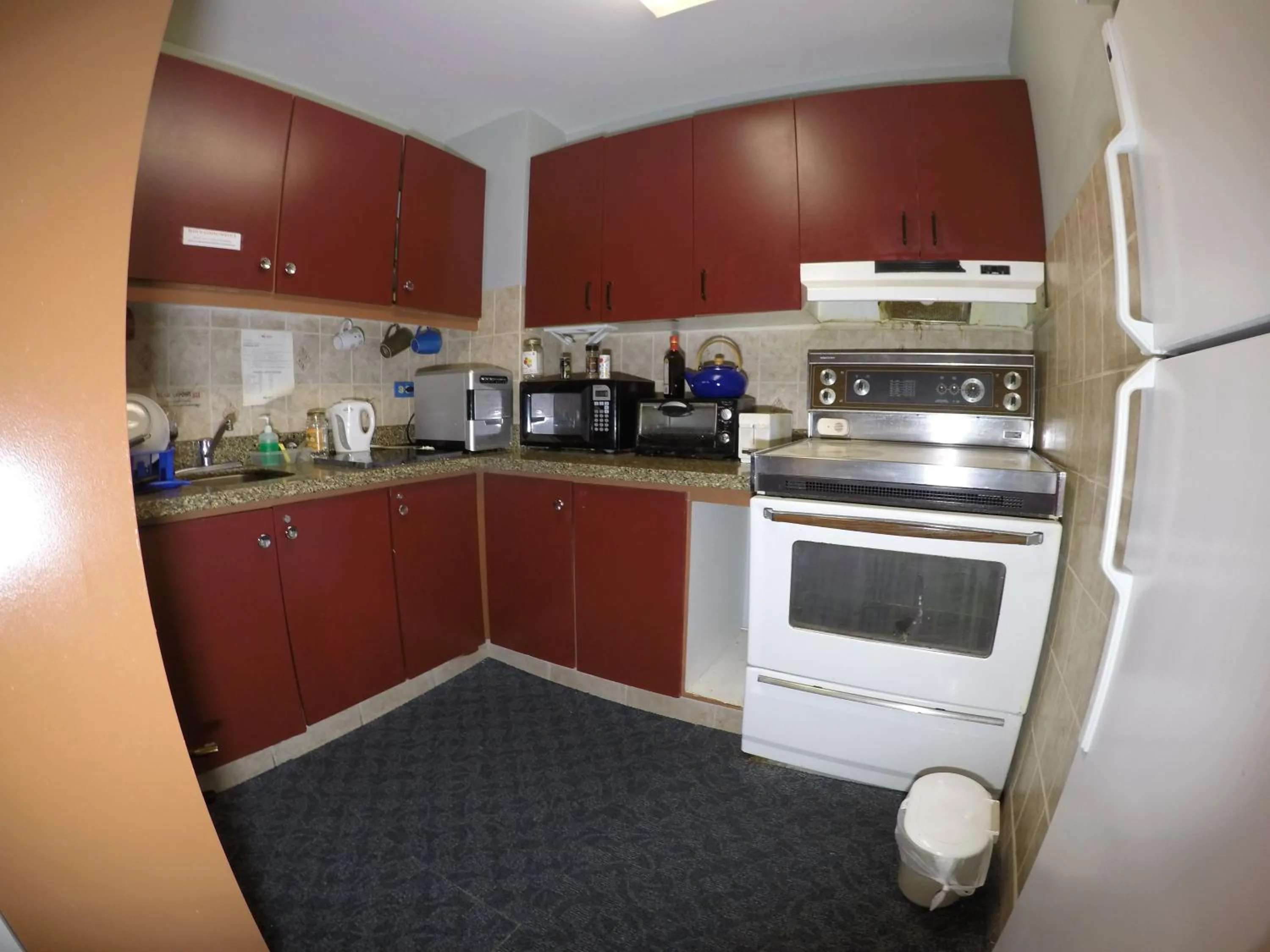 Kitchen or kitchenette in Saint Lawrence Residences and Suites
