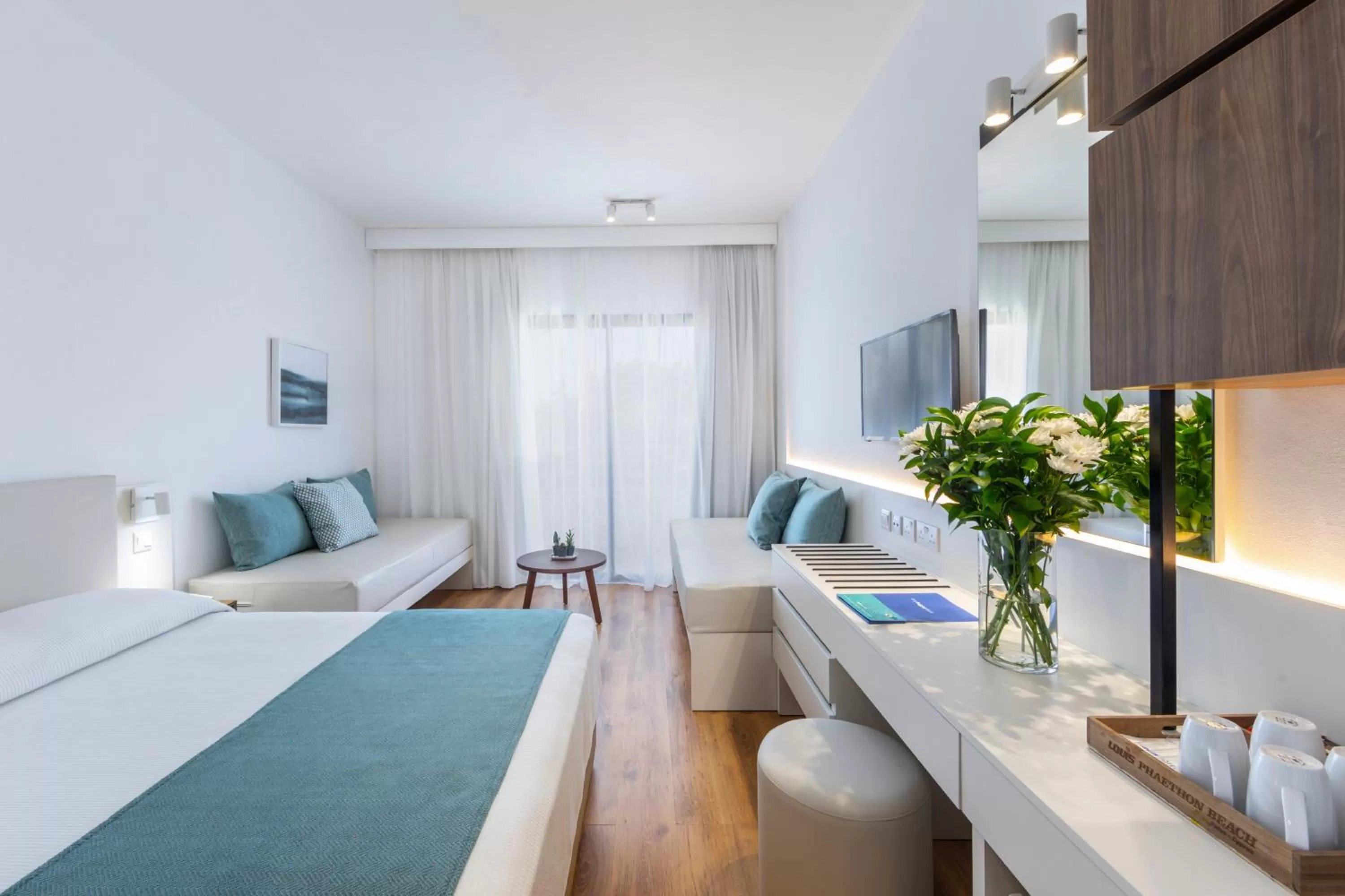 Photo of the whole room, Bed in Louis Phaethon Beach