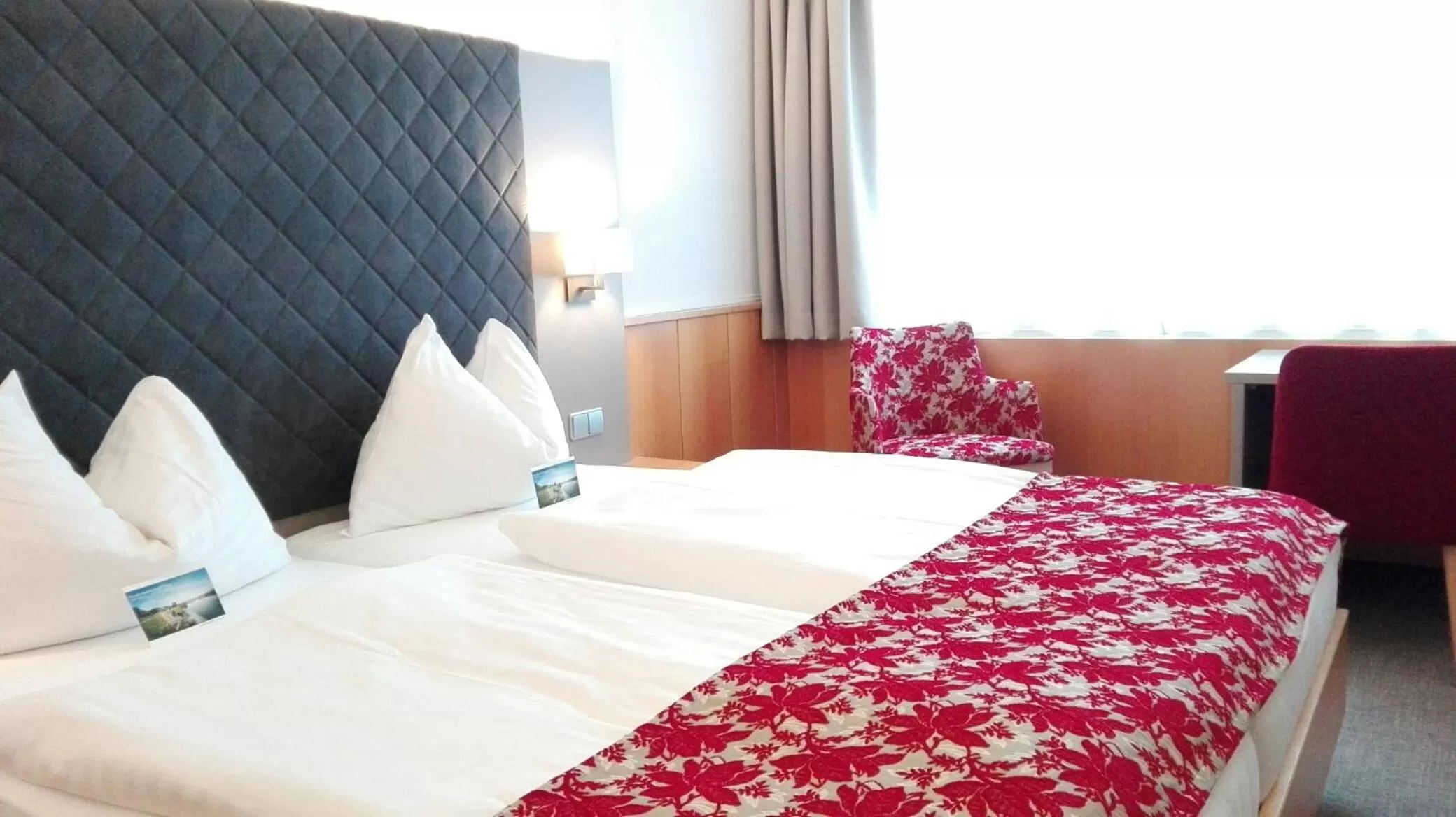 Photo of the whole room, Bed in Stadtoase Kolping Hotel