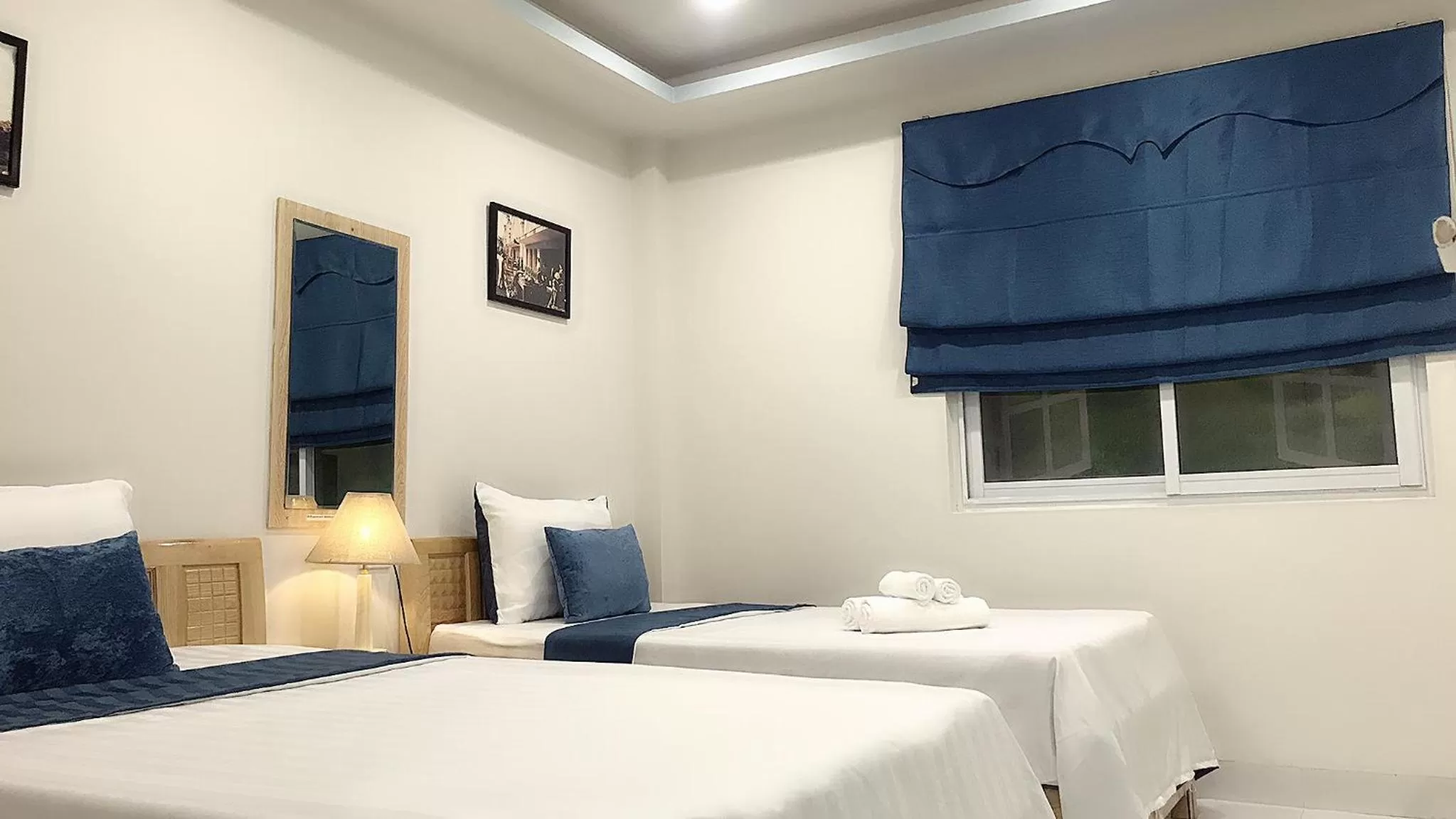 Bed in Hanoi Holiday Hotel