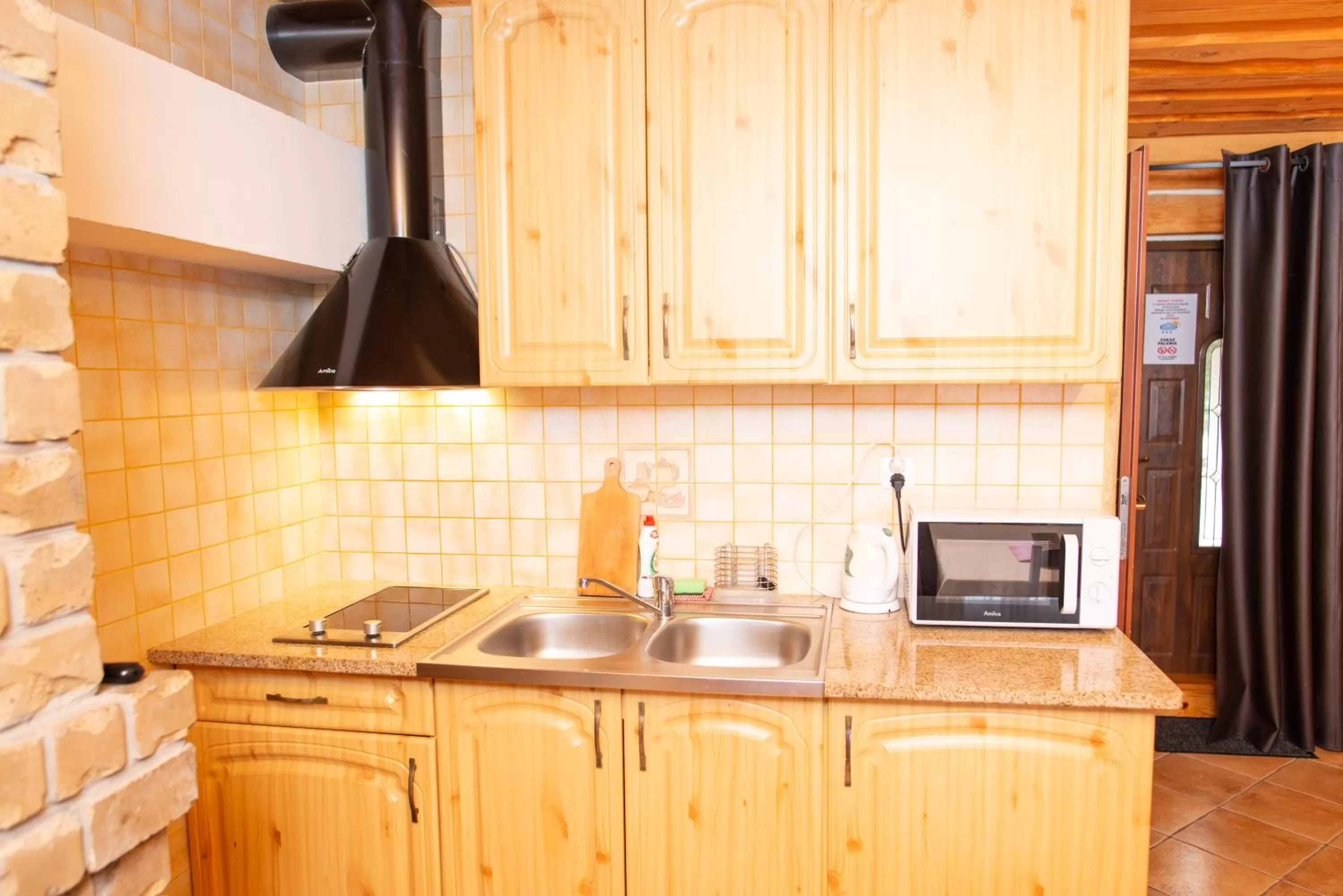 Kitchen or kitchenette in Gościniec Pięciu Stawów