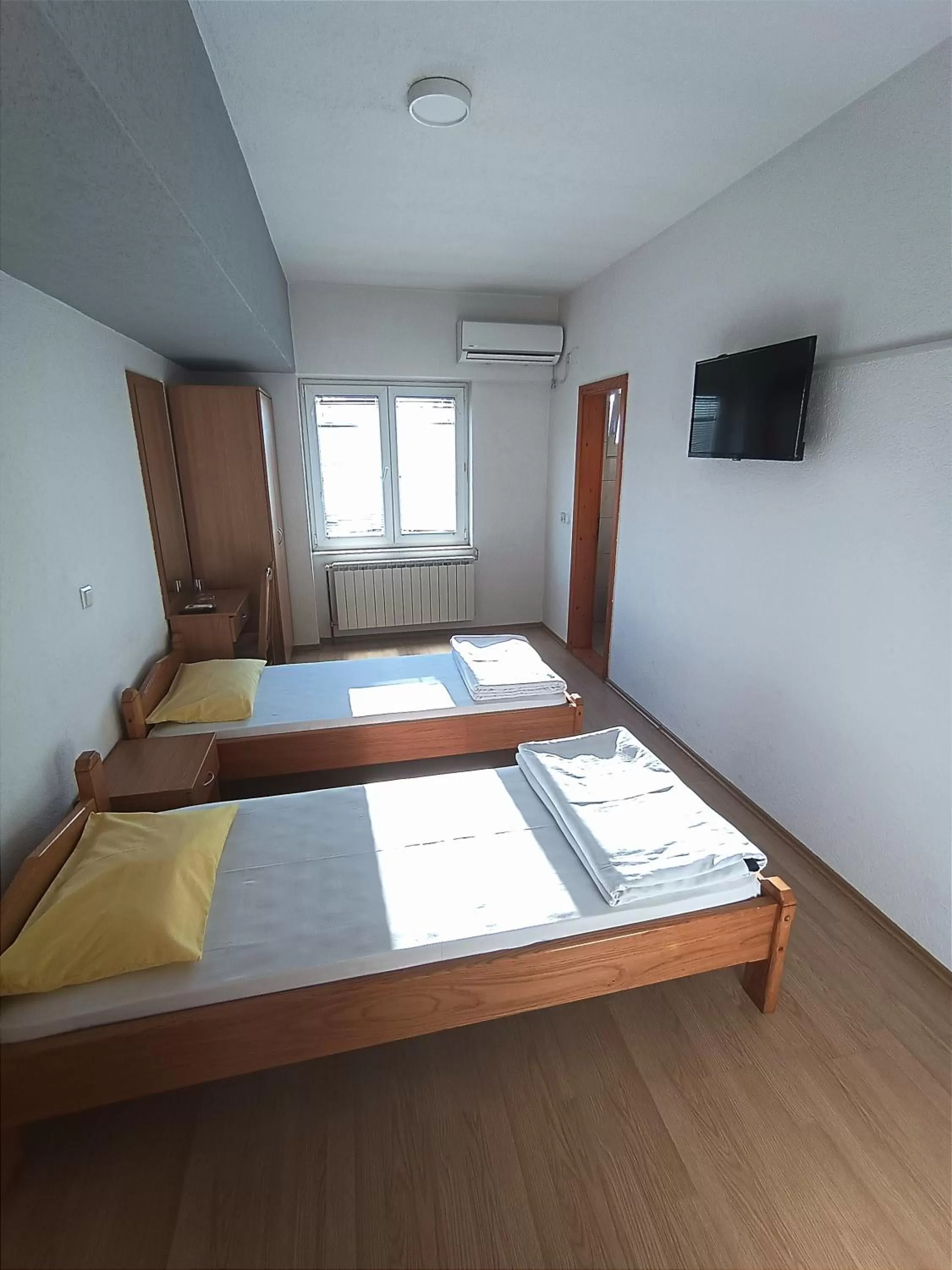 Bed in Motel Gas-Petrol