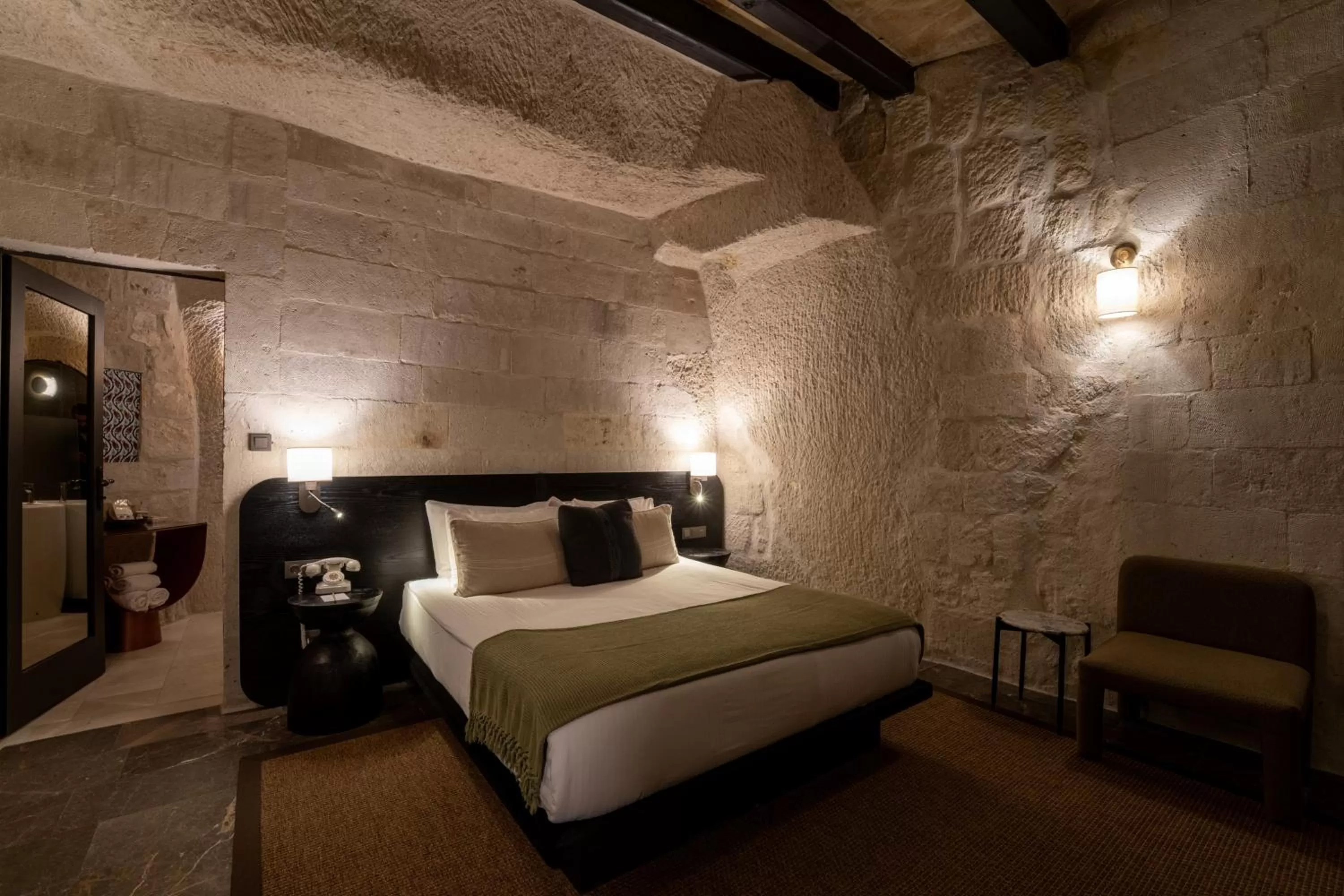 Bedroom, Bed in Artemis Cave Suites & Spa- Adults Only