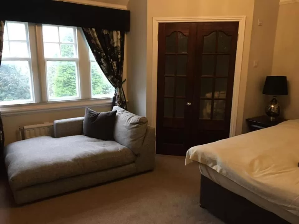 Bed in Brass Castle Country House Accommodation