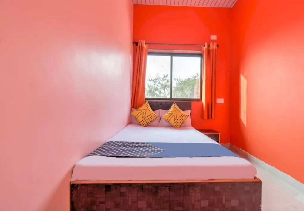 Bed in Hotel Nisarg Lodging And Restaurant