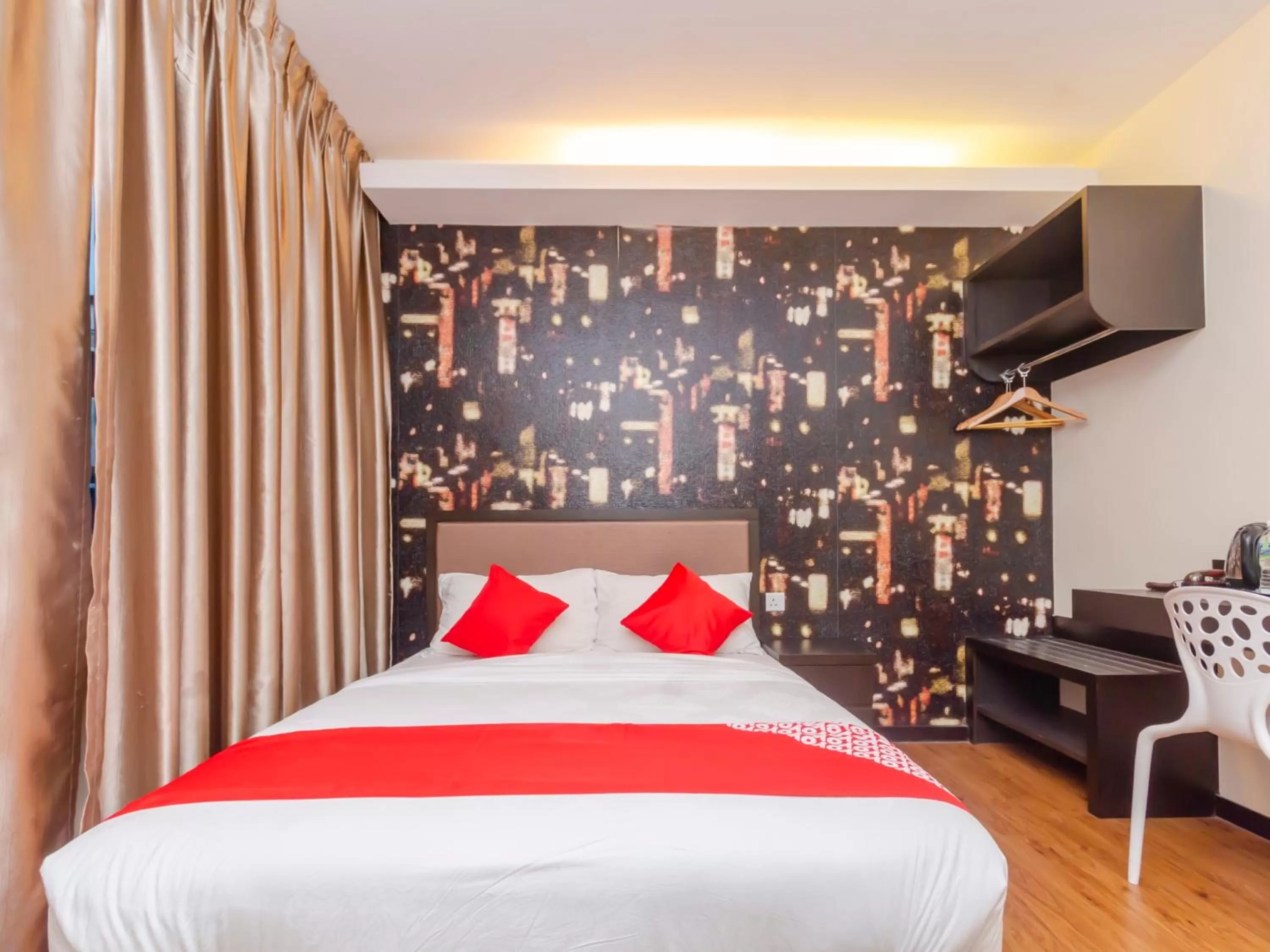 Bedroom in OYO 1214 Oro Hotel