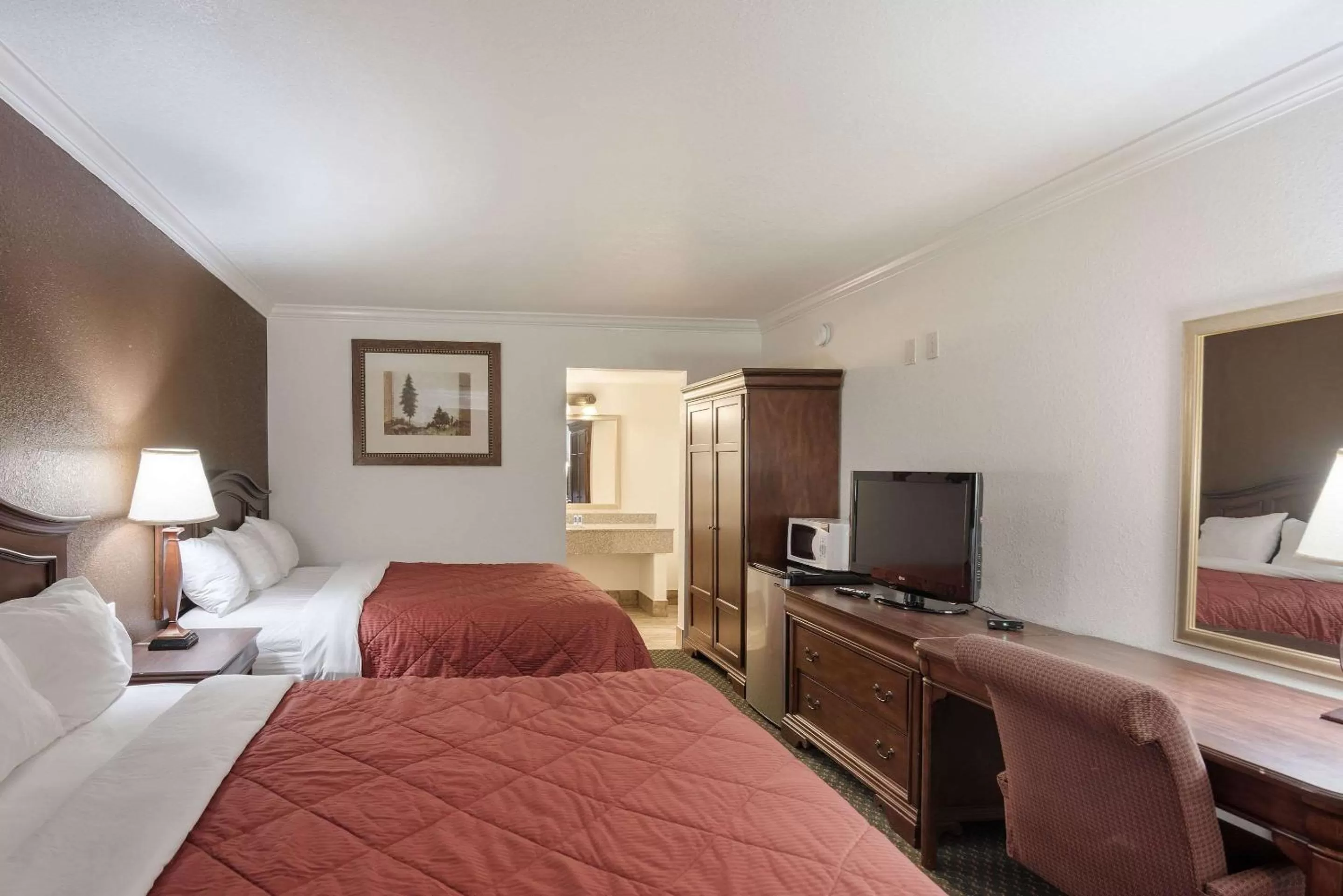 Photo of the whole room, TV/Entertainment Center in 1st Interstate Inn