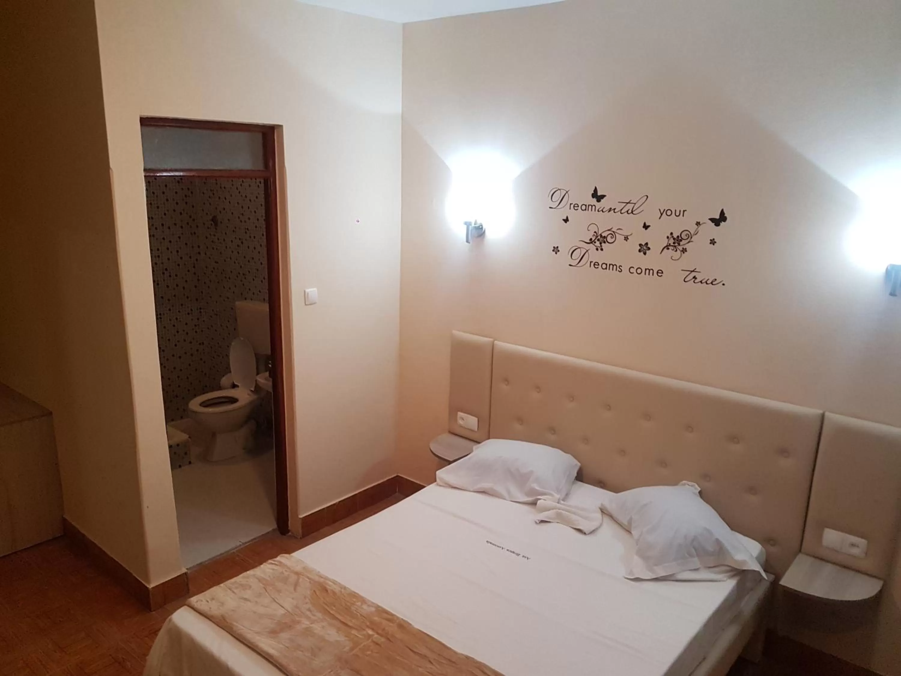 Bed in Pensão Asa Branca