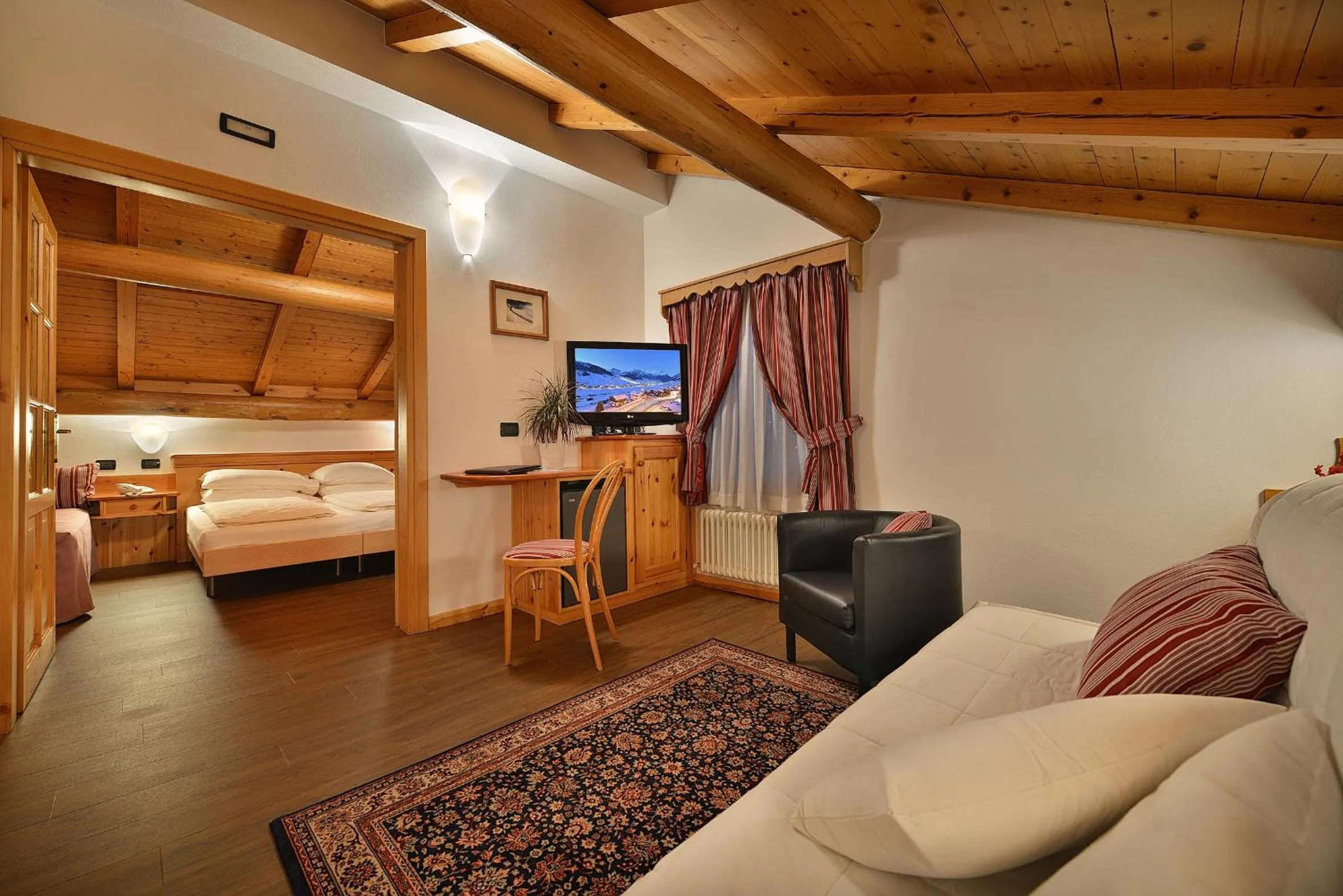 Photo of the whole room, Bed in Hotel Livigno