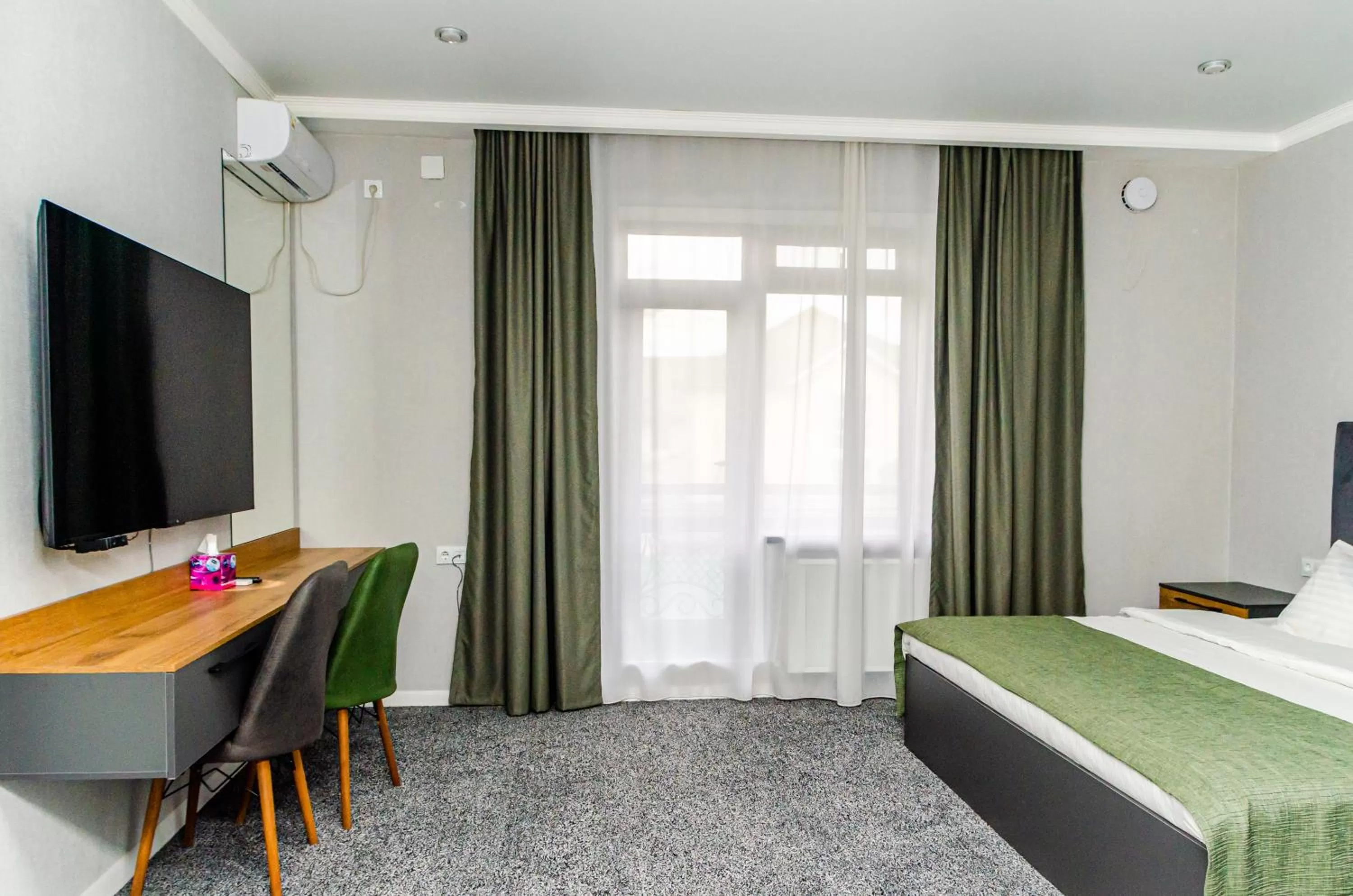 Property building, Bed in Dosman Hotel Bishkek