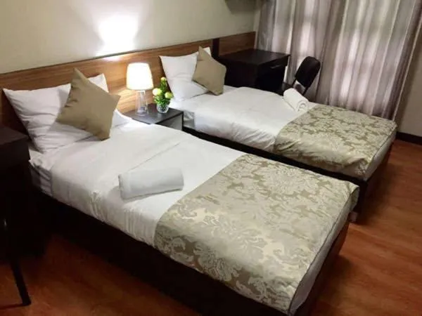 Bed in The Studio 87 Residences