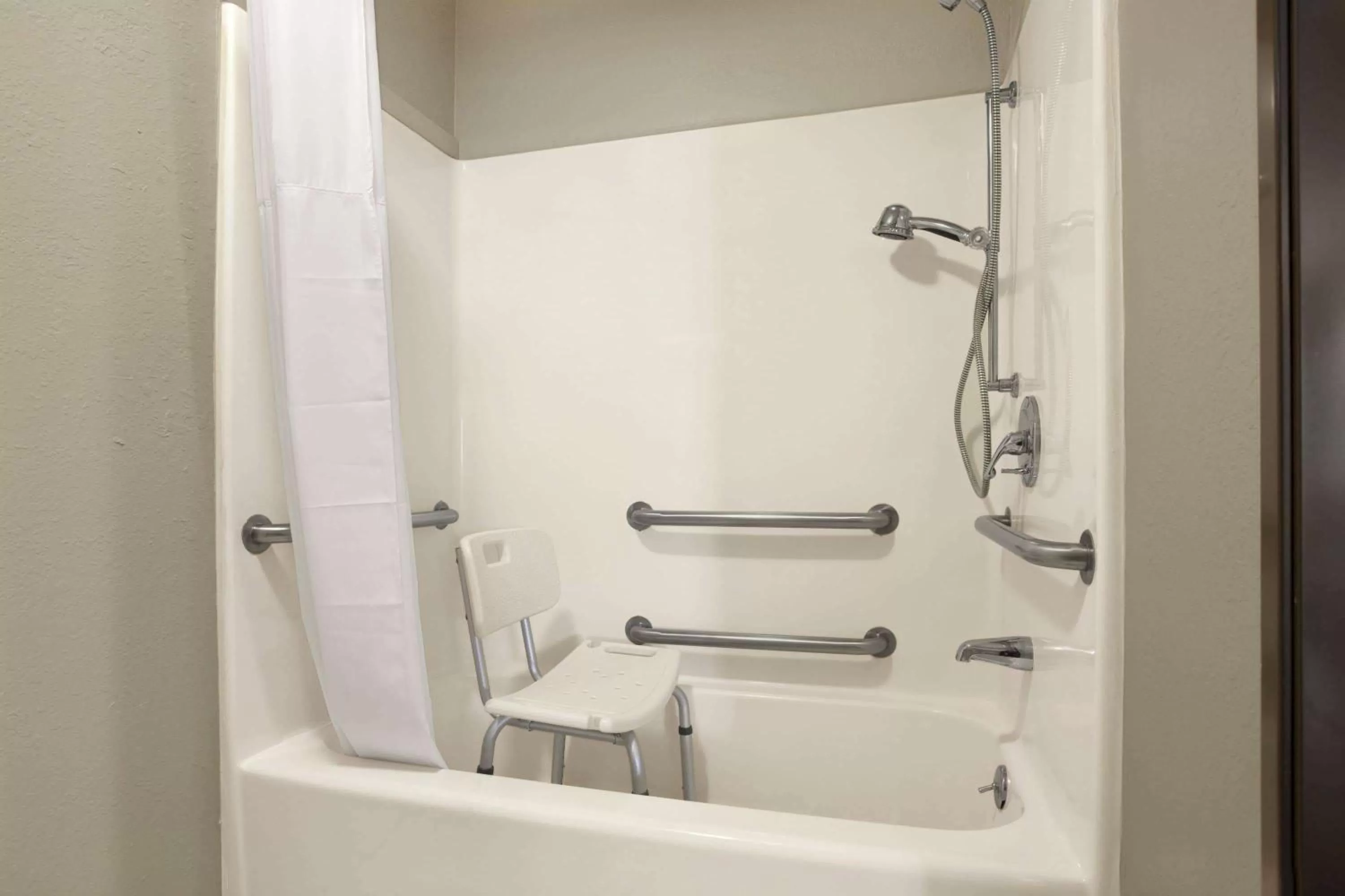 Bathroom in Days Inn by Wyndham Sheridan