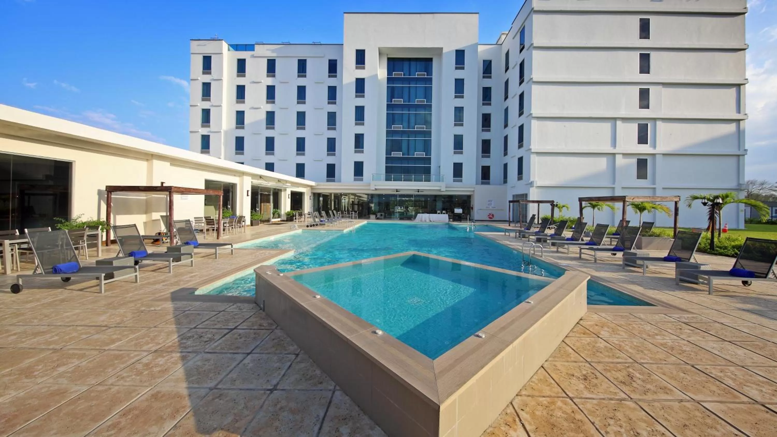 Swimming pool in Crowne Plaza Airport by IHG