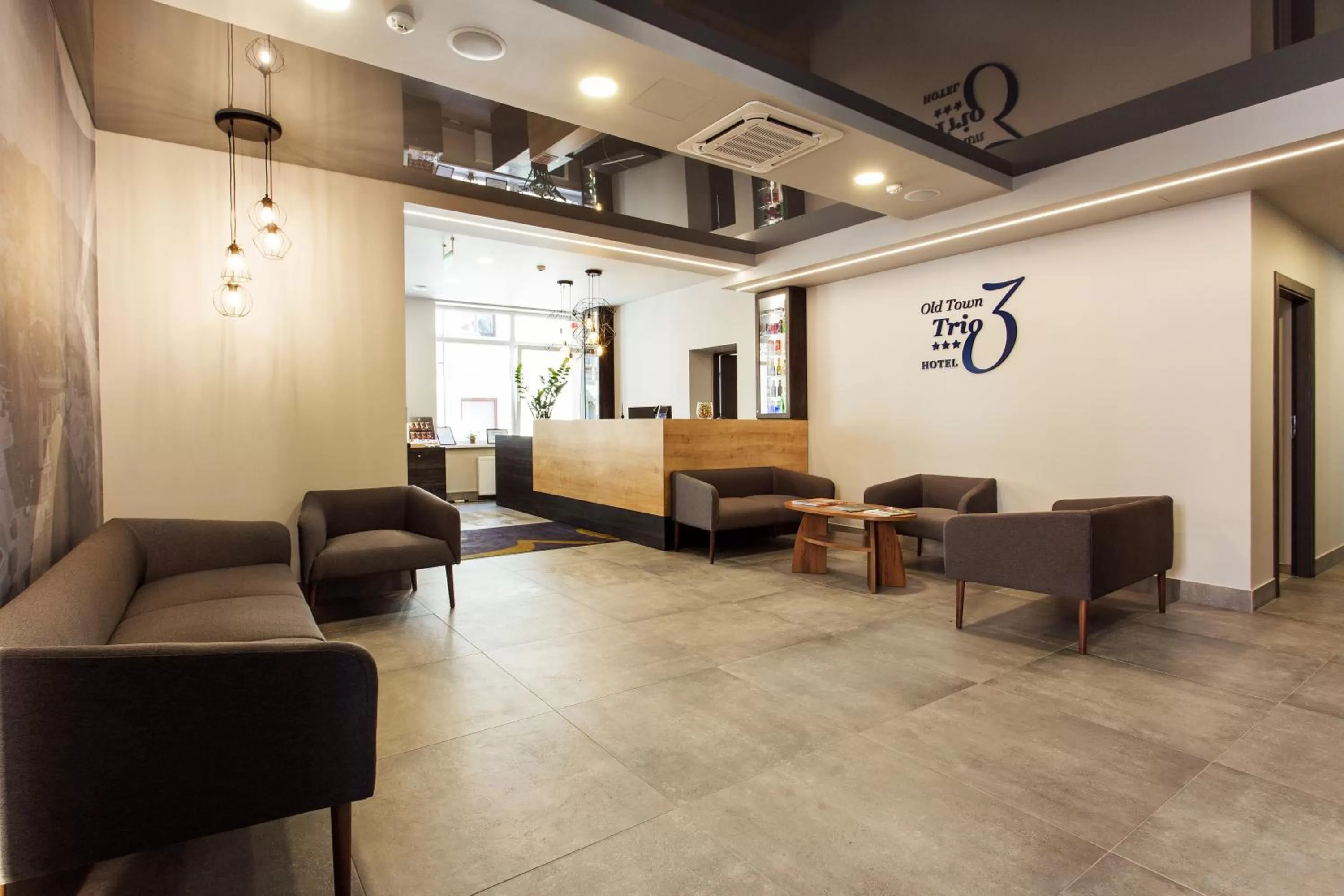 Property logo or sign in Old Town Trio