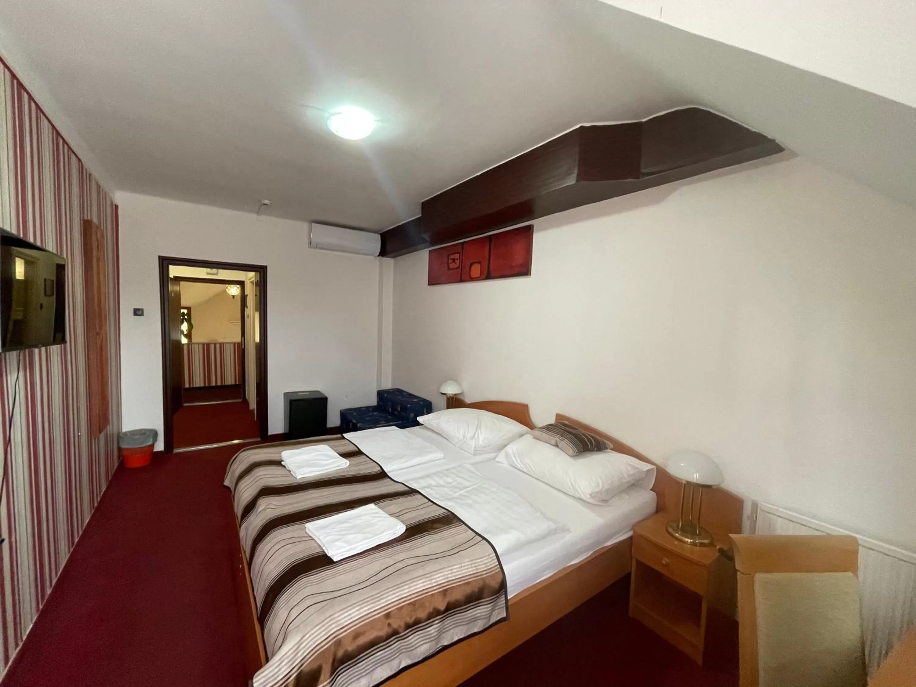 Bed in Hotel Minaret&Étterem