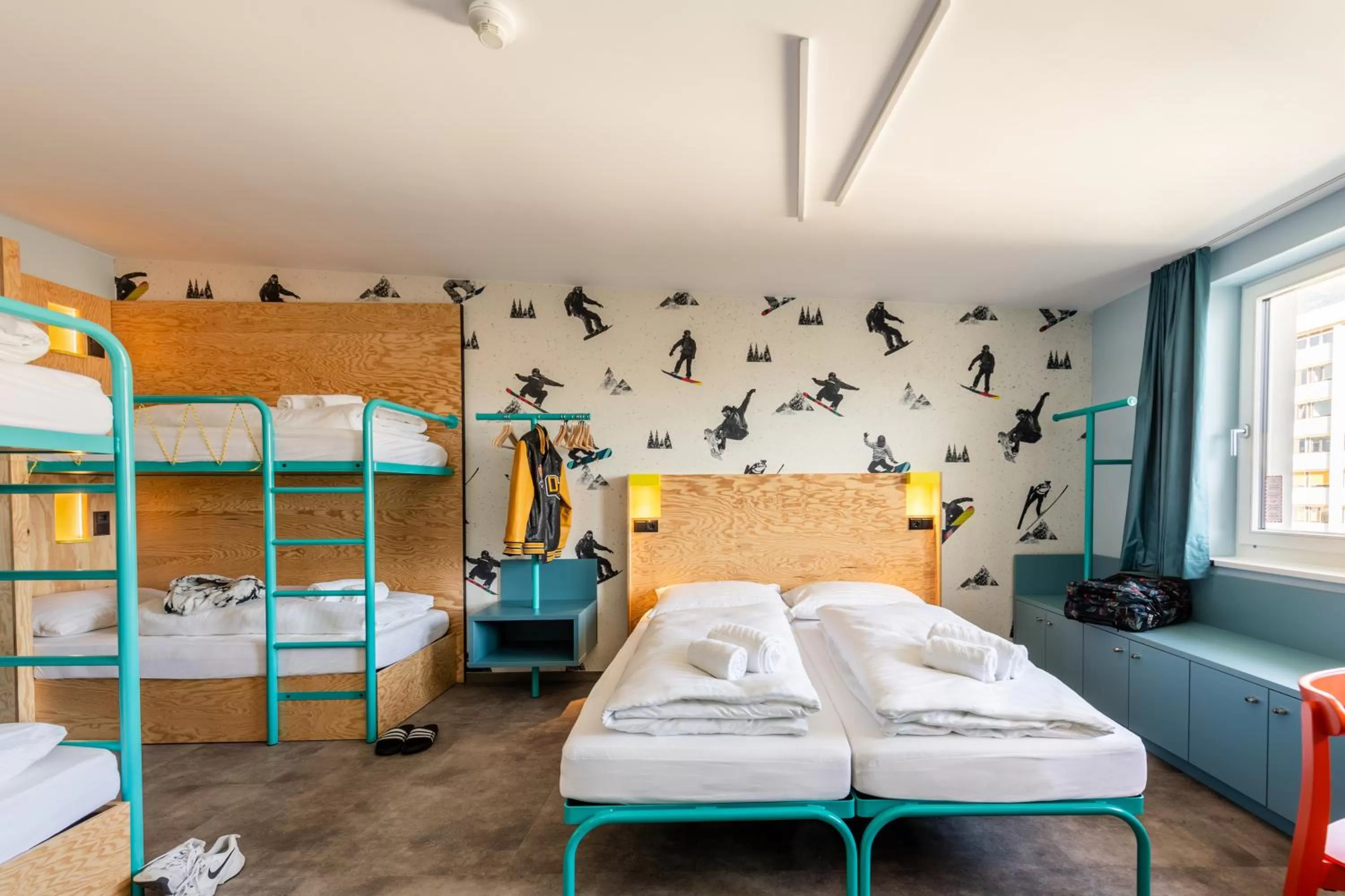 Photo of the whole room, Bed in MEININGER Hotel Innsbruck Zentrum