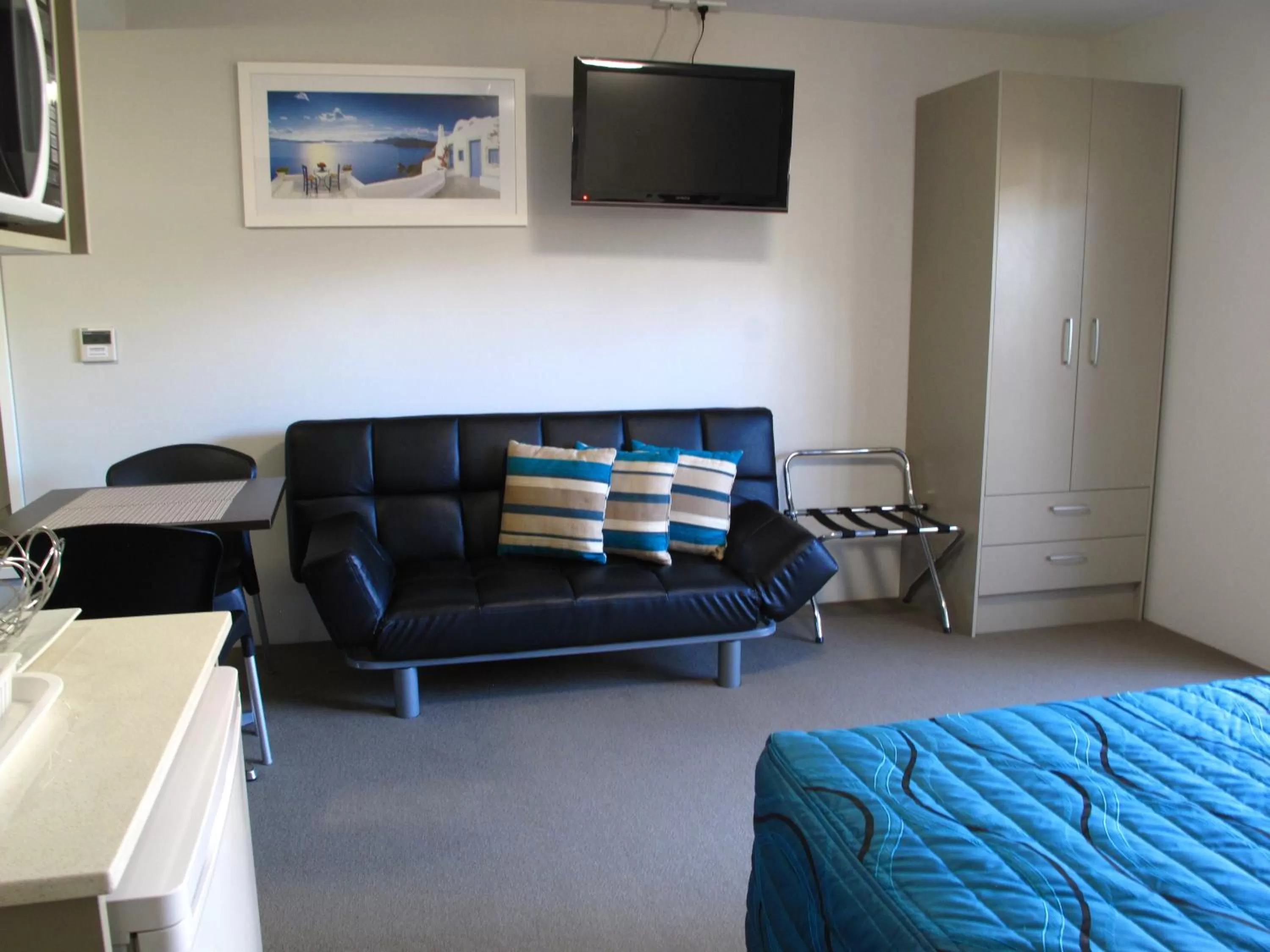 Seating area, Bed in Strathfield Executive Accommodation
