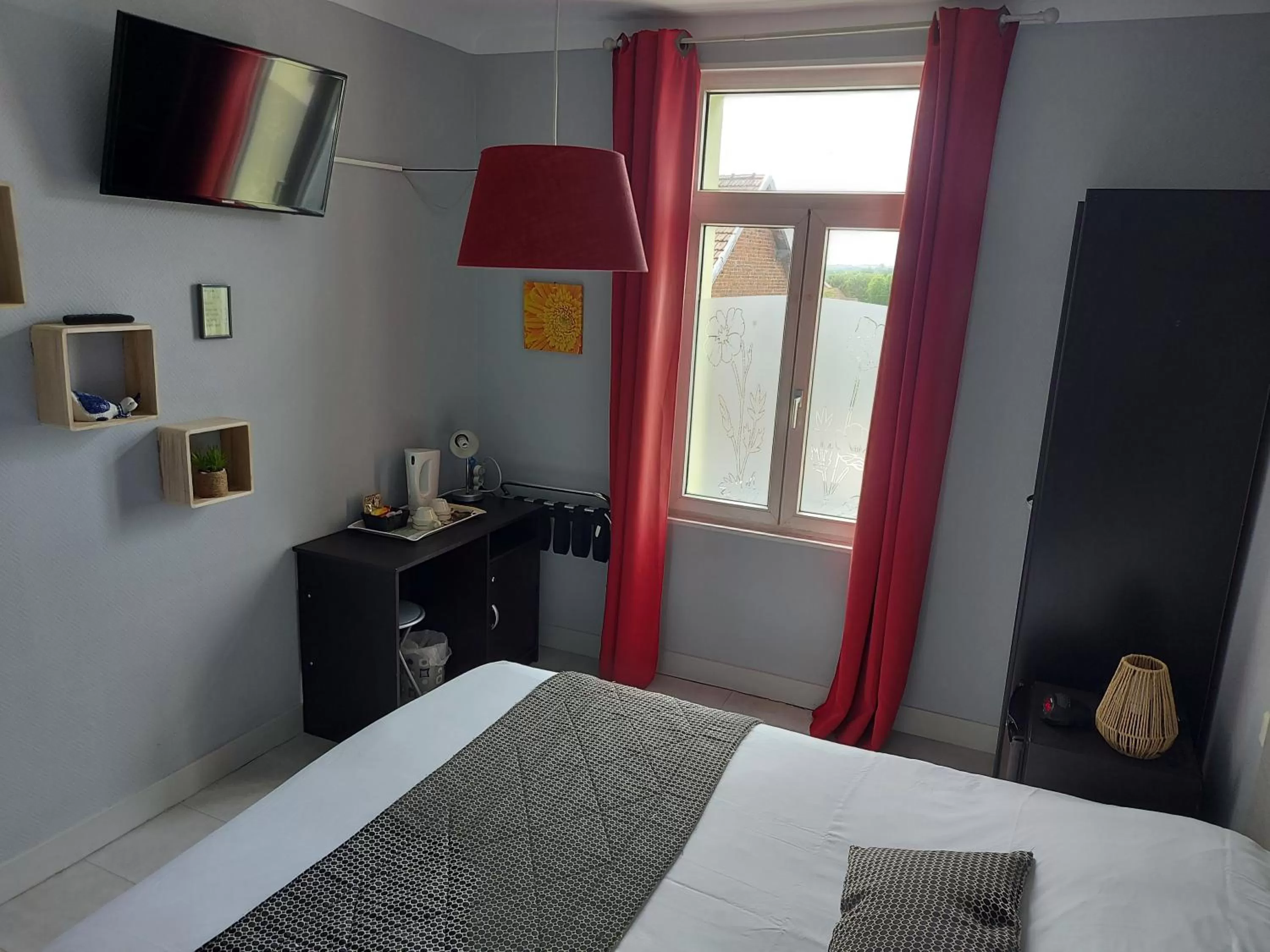 Bed in Hotel De La Paix