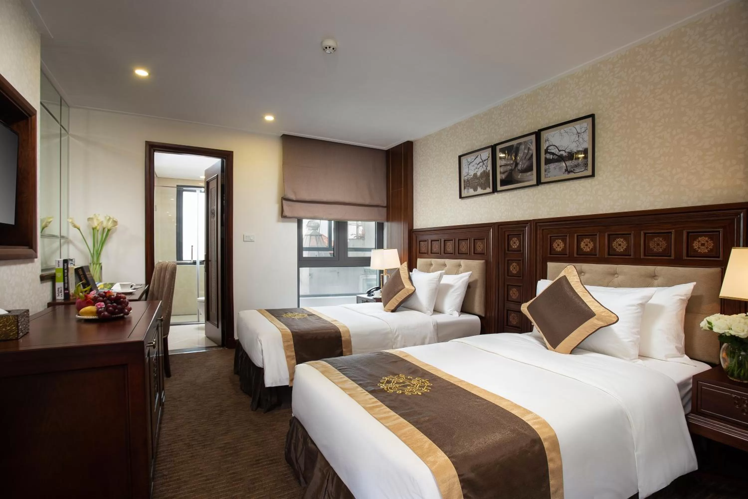 Bed in Rex Hanoi Hotel