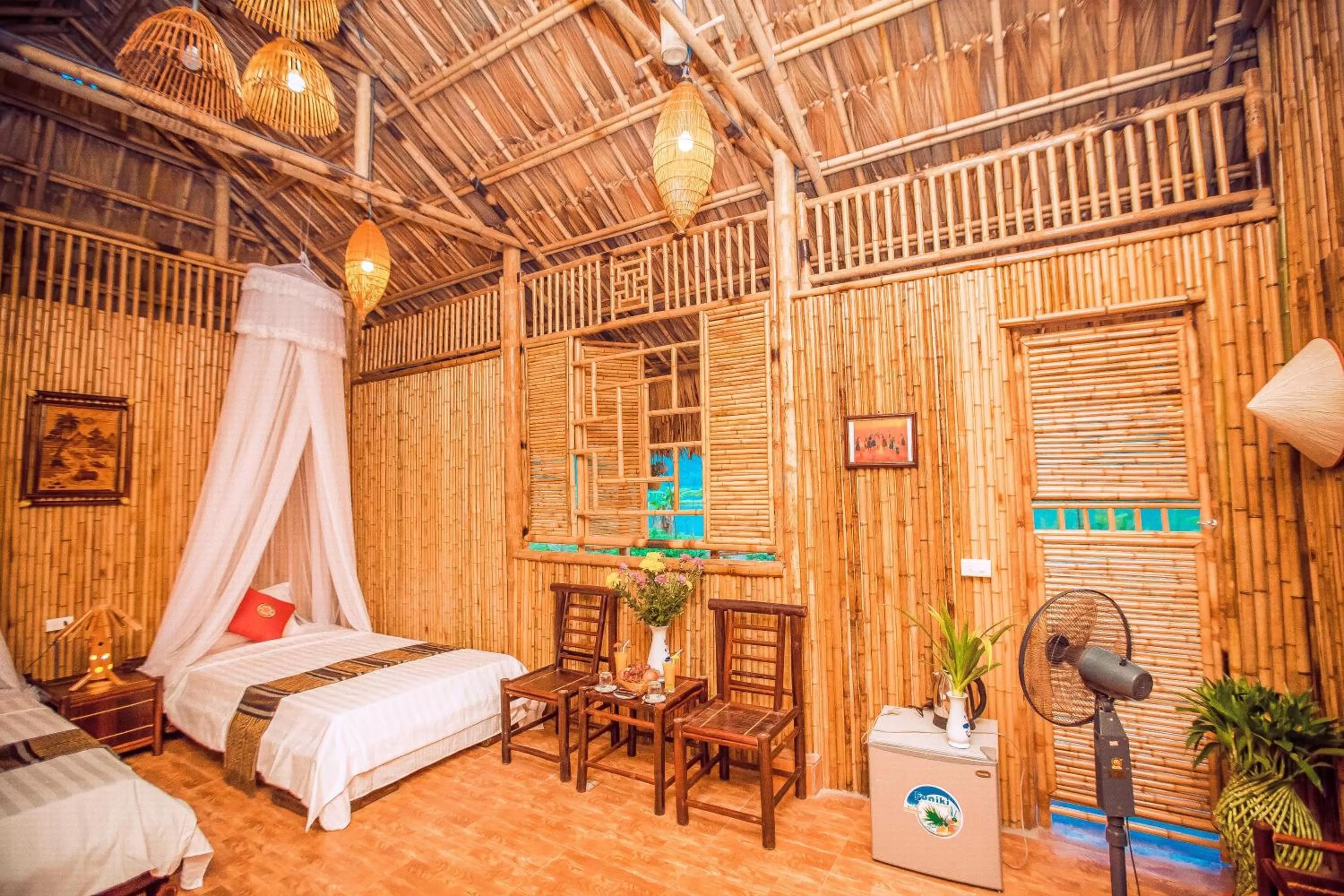 Photo of the whole room, Bed in Tam Coc Rice Fields Resort