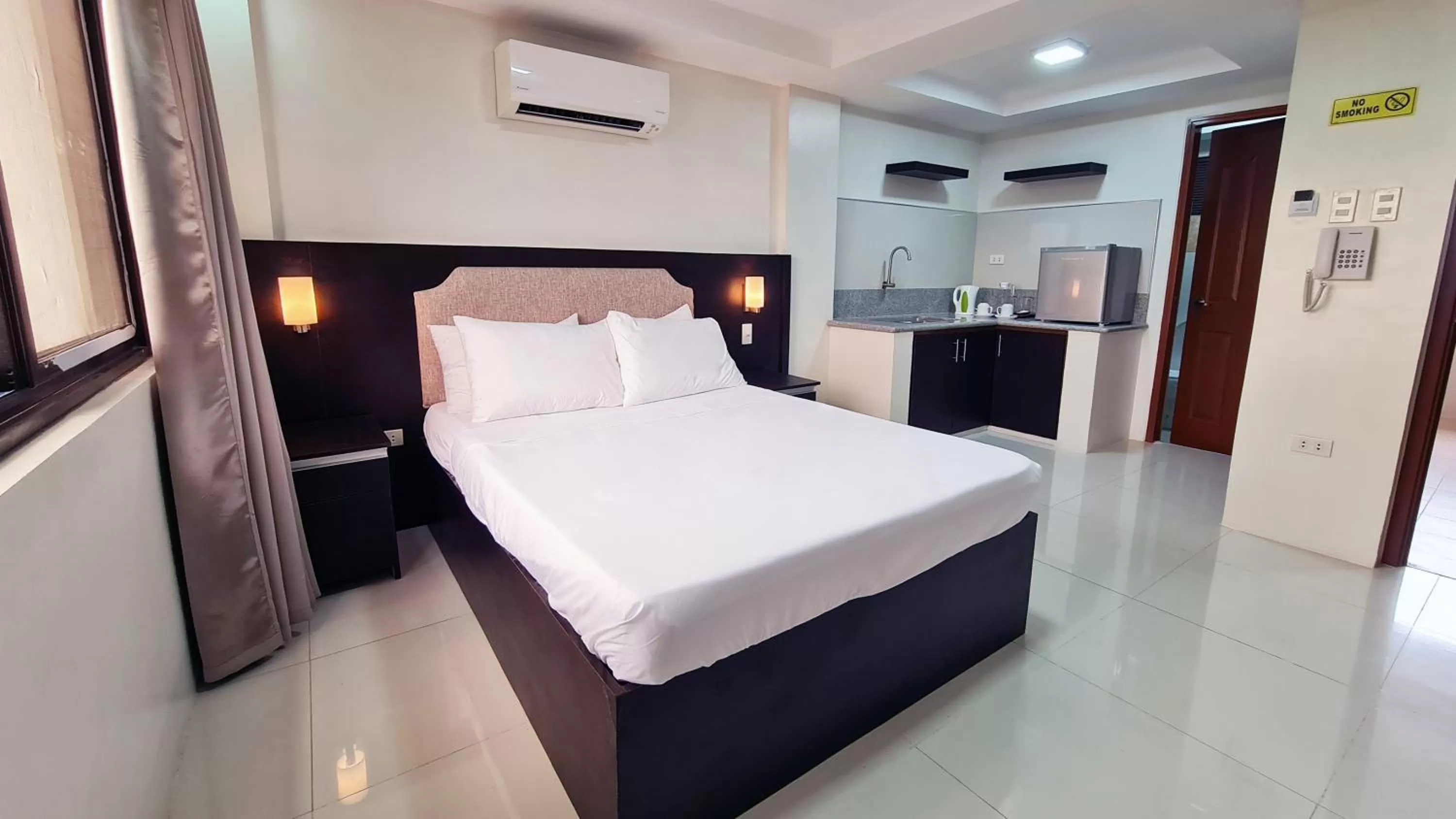 Bed in Staycation Hotel