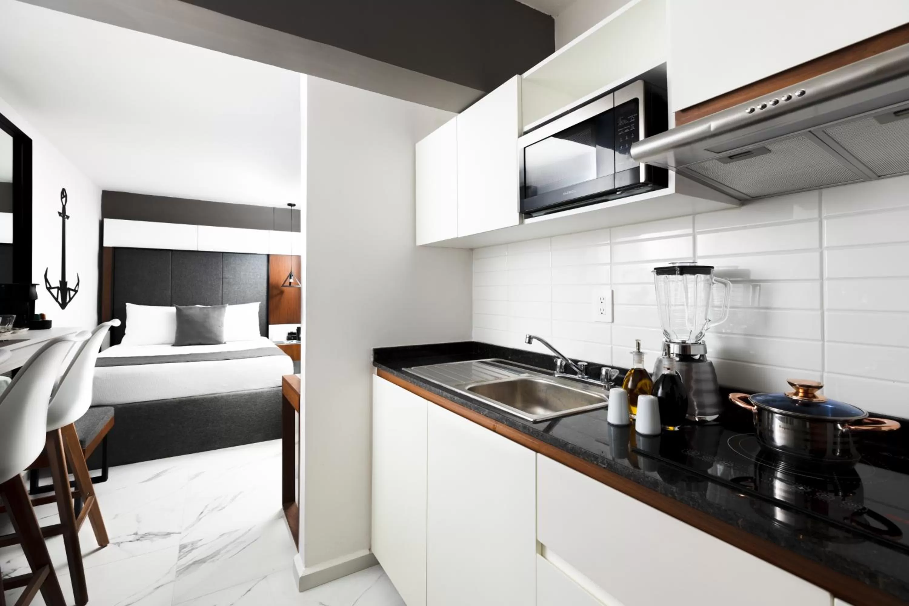 Kitchen or kitchenette, Bed in Seven Boutique Apartments Cancún