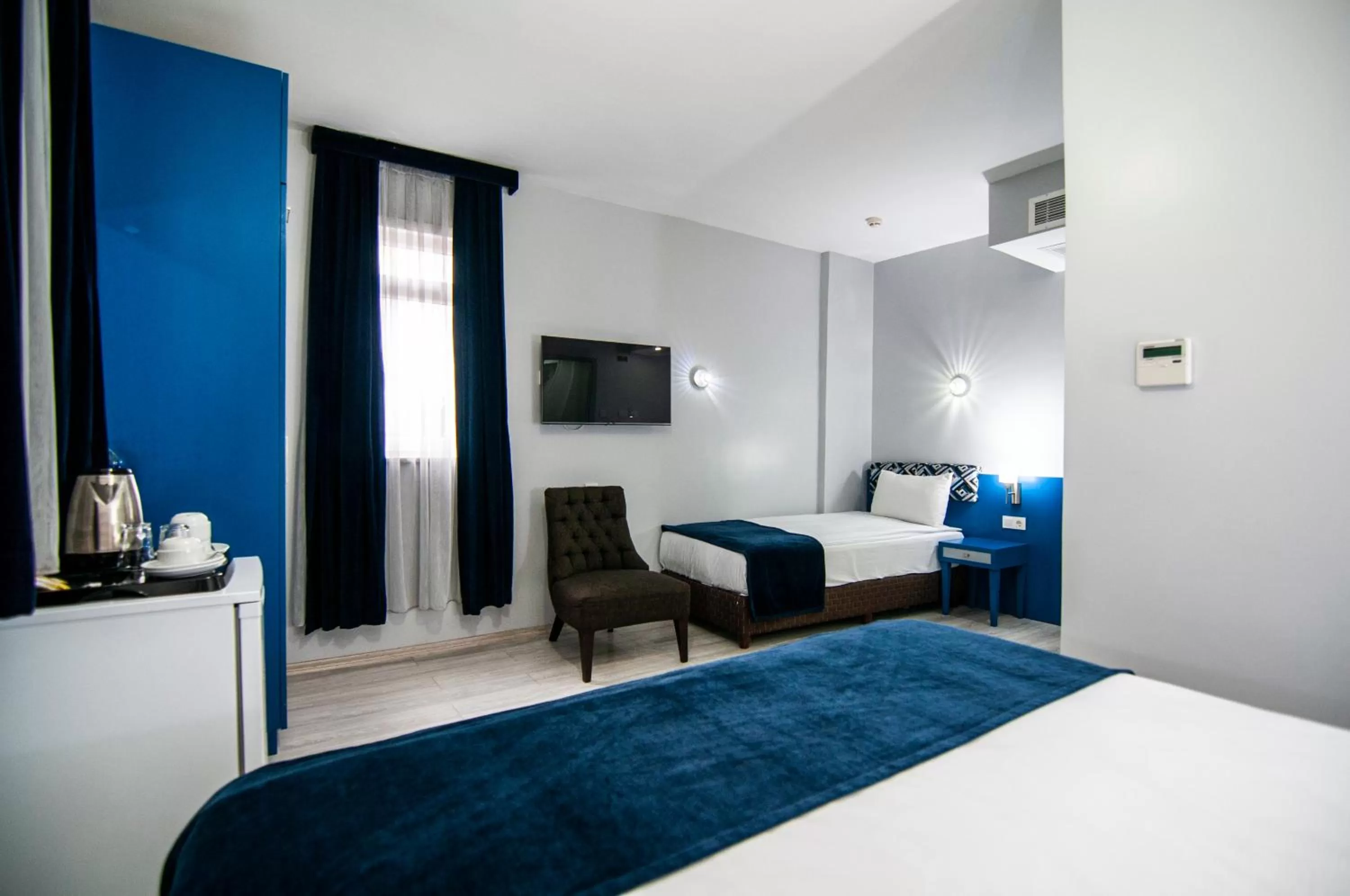 Bed in Lapis Inn Hotel & Spa ( Ex. Ambassador Hotel)