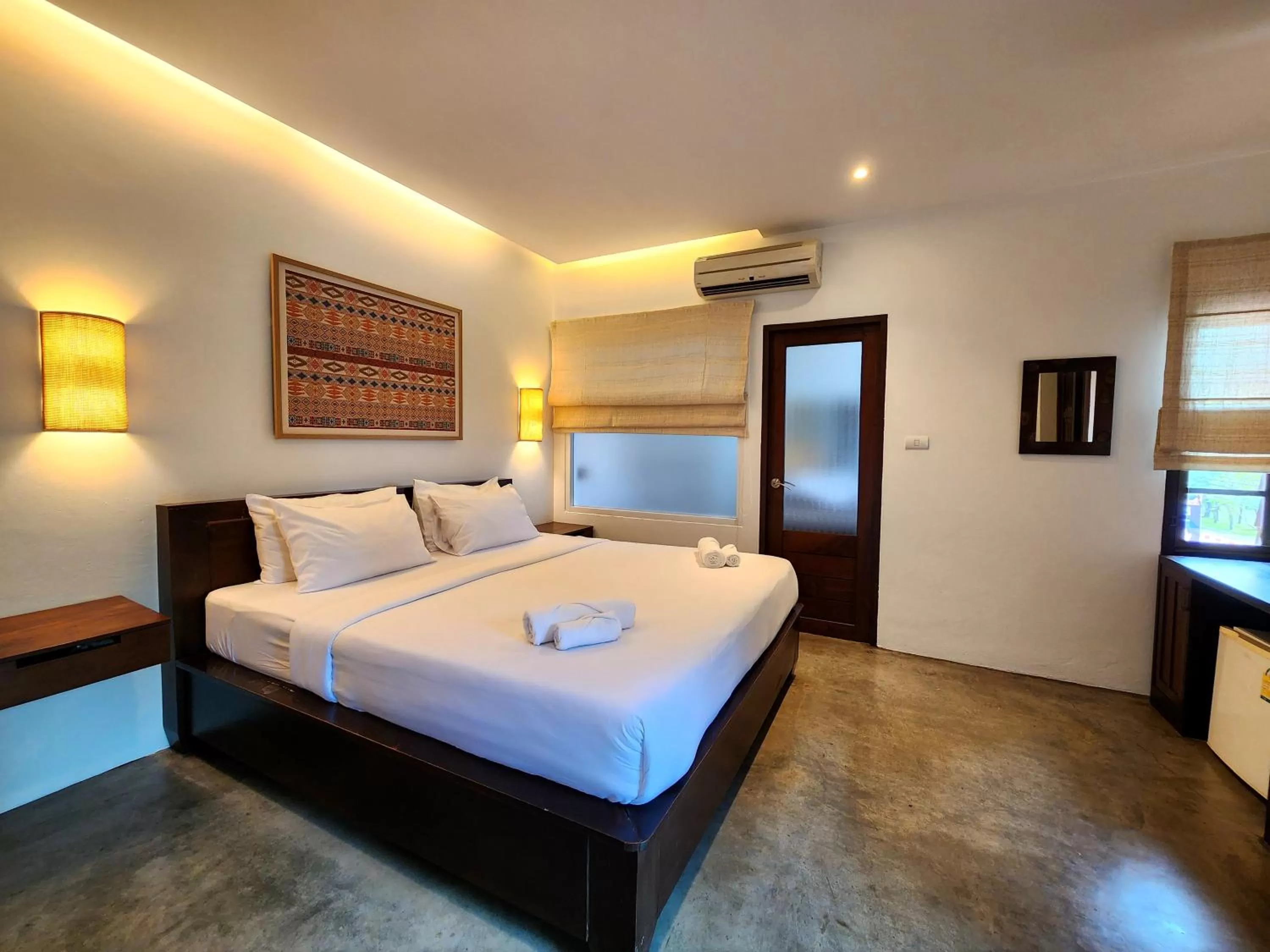 Bed in The Peaberry Boutique Hotel