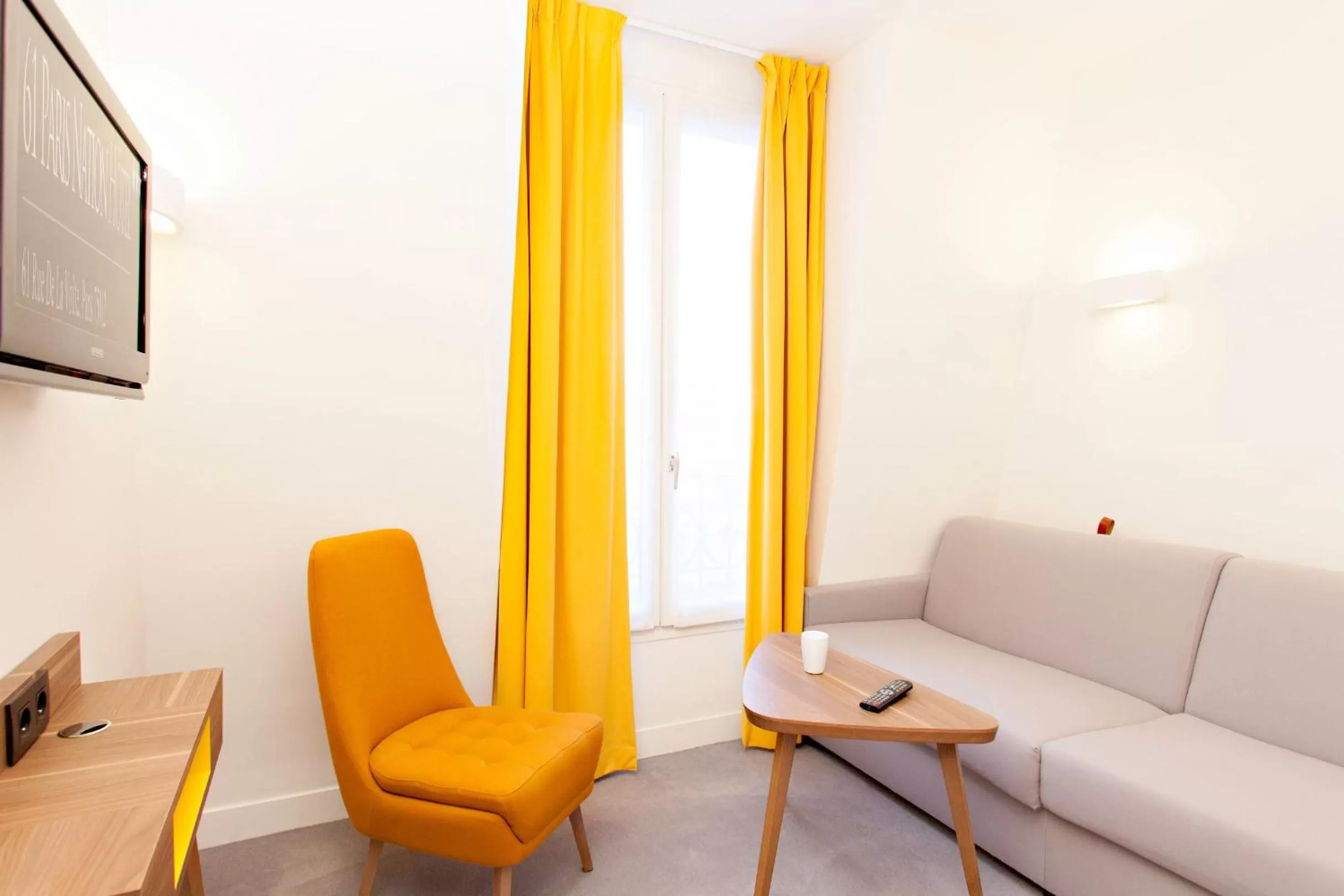 Seating area in Best Western Plus 61 Paris Nation Hotel