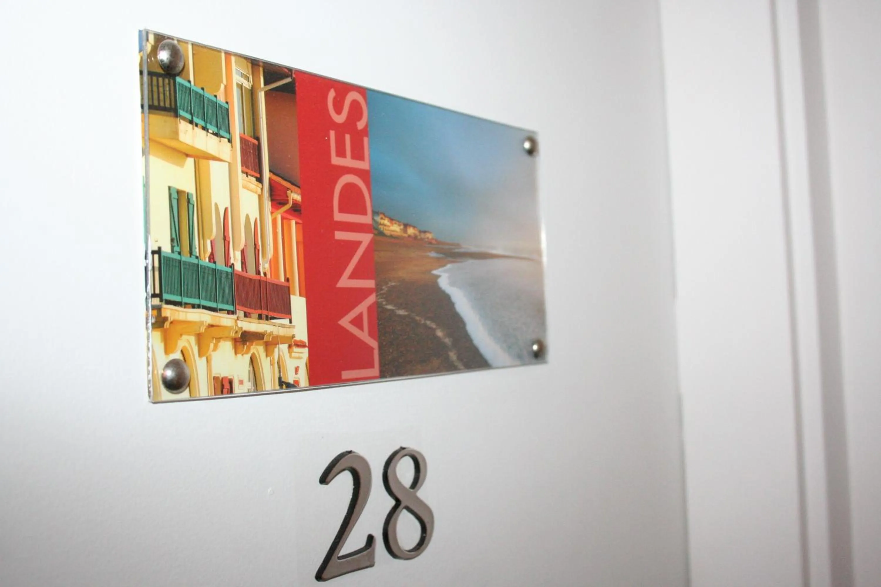 Bedroom in Hôtel Le Relais Dax