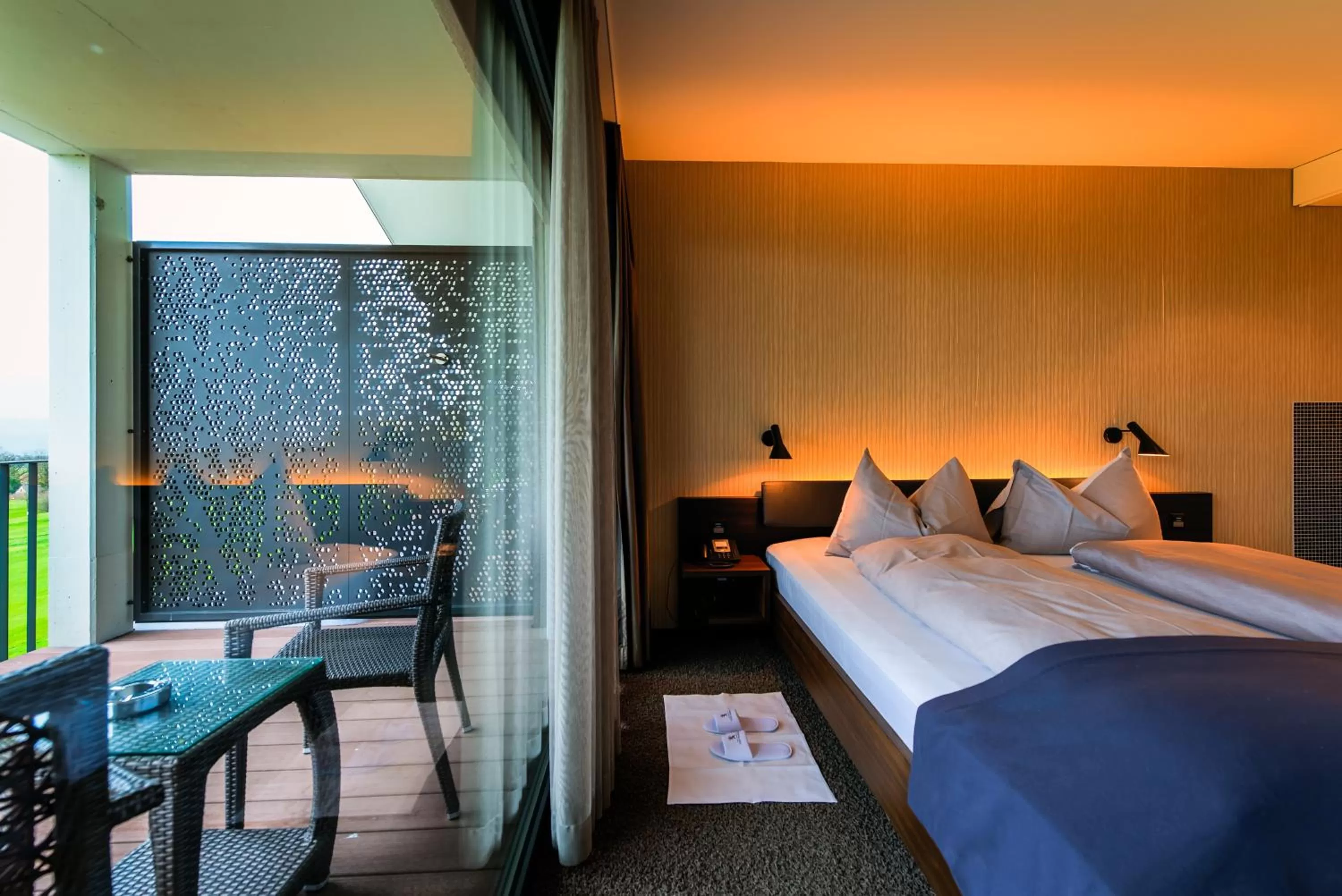 Photo of the whole room, Bed in Wellnesshotel Golfpanorama