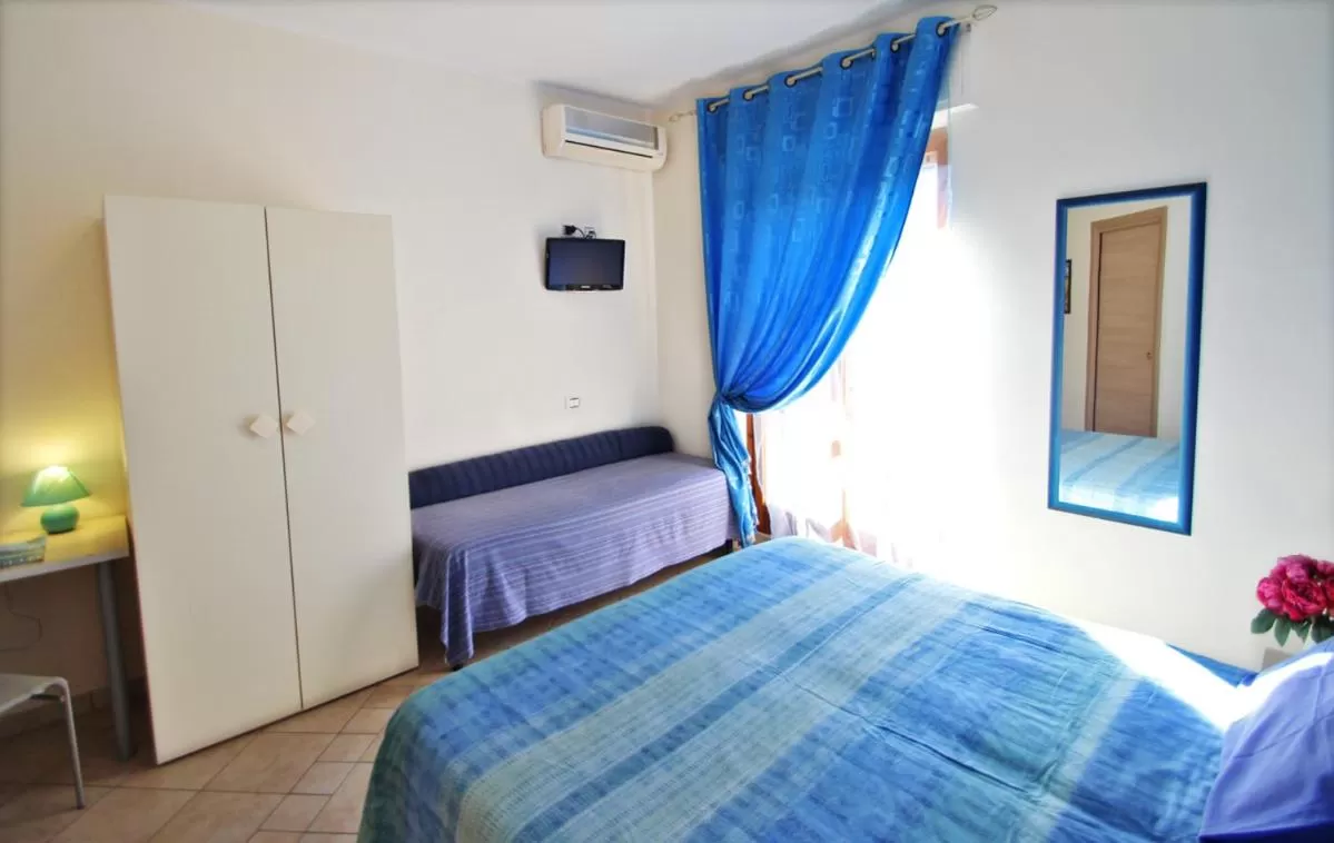 Photo of the whole room, Bed in Il Perugino